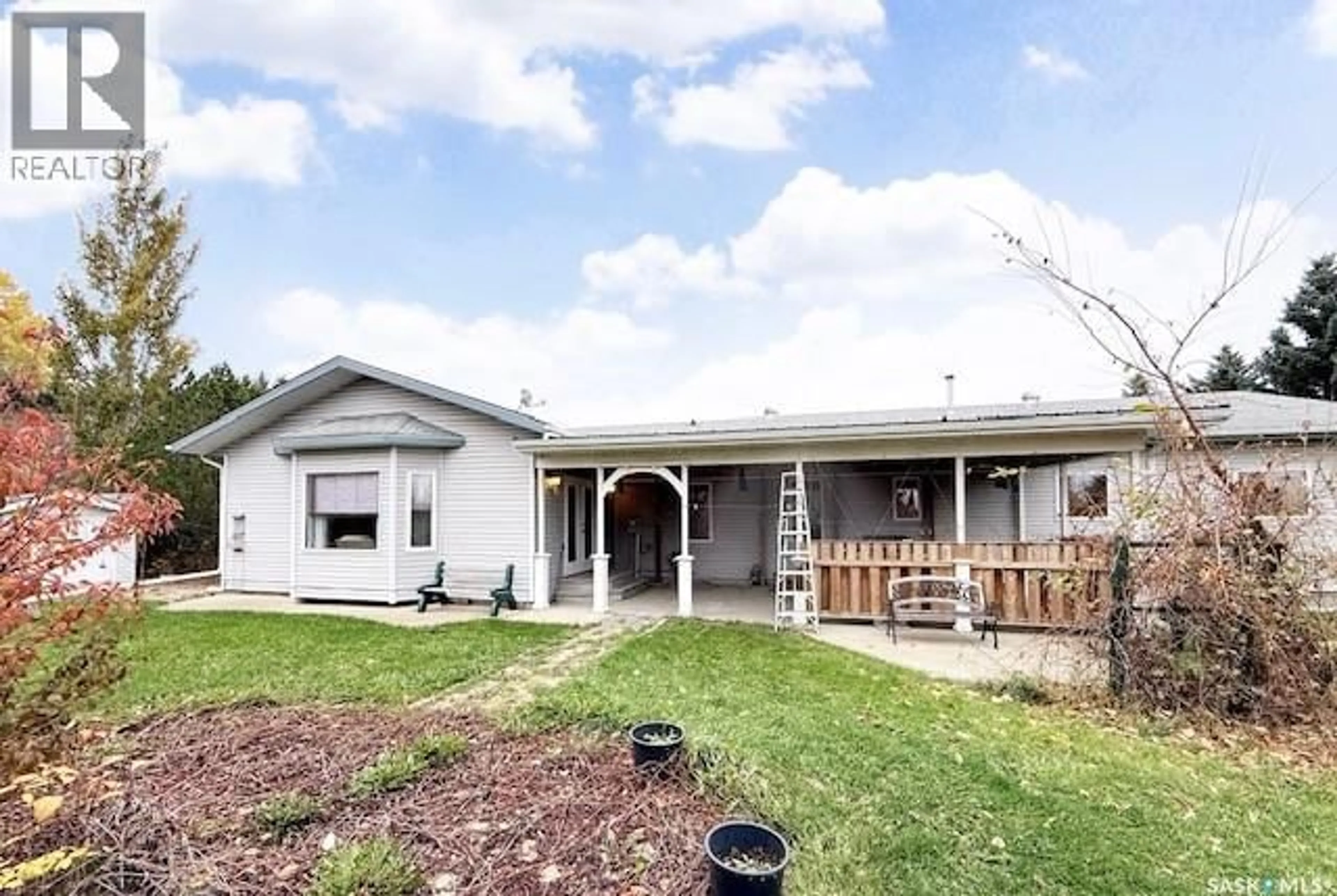 A pic from outside/outdoor area/front of a property/back of a property/a pic from drone, unknown for 60 BANKS CRESCENT, Kamsack Saskatchewan S0A1S0