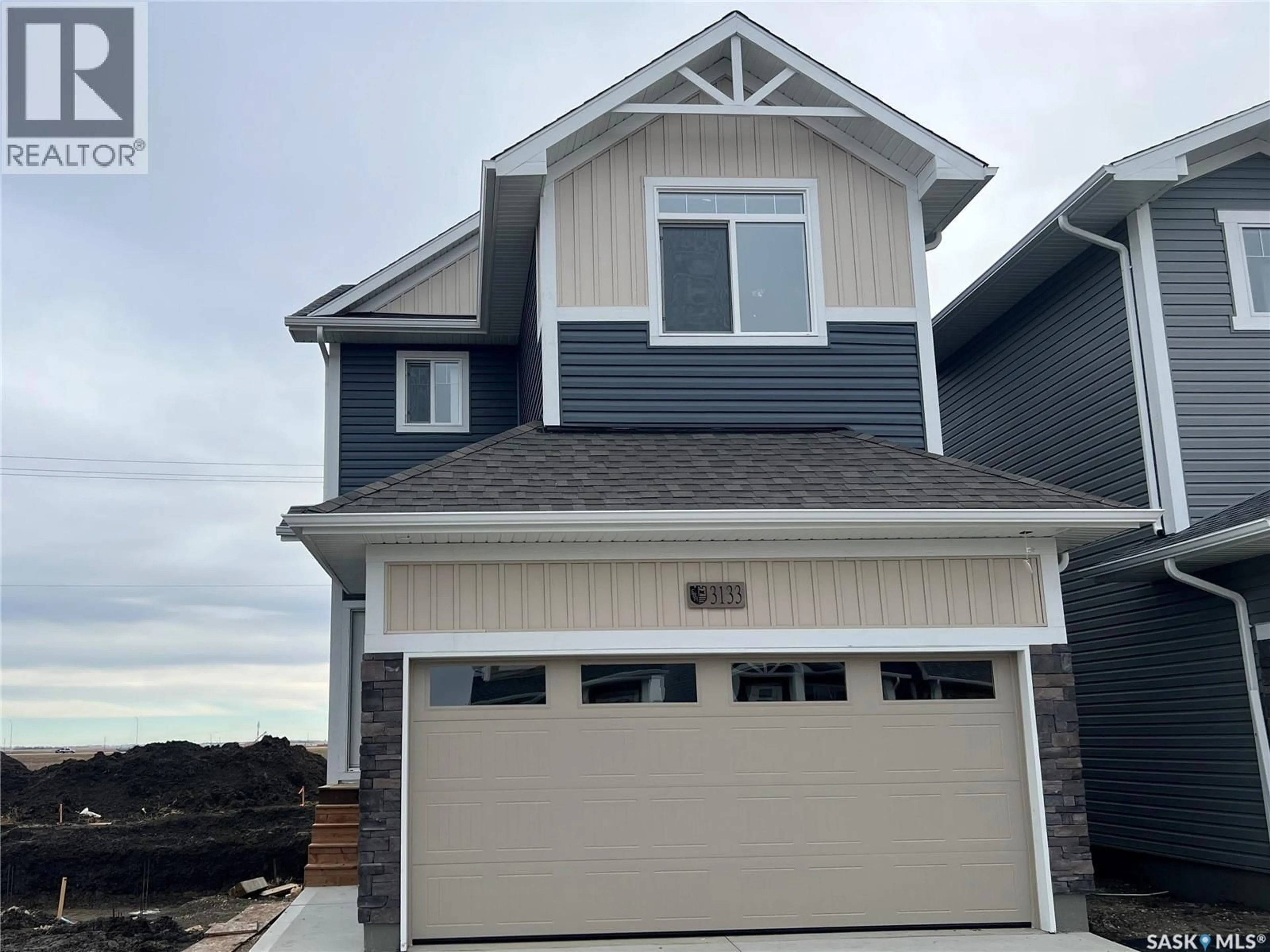 Home with vinyl exterior material, street for 3133 GREEN TURTLE ROAD, Regina Saskatchewan S4V4C5