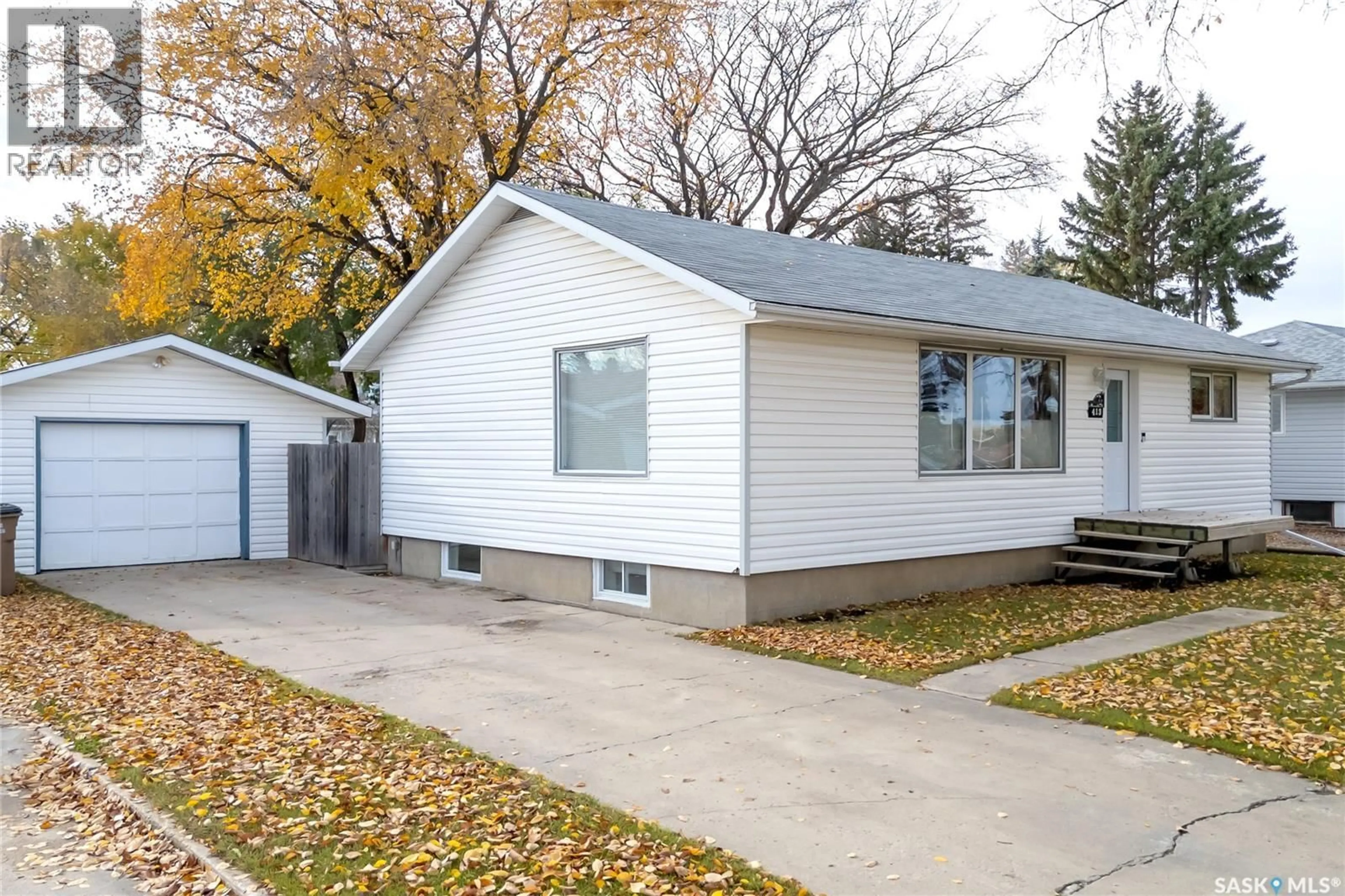 Home with vinyl exterior material, street for 413 BEMISTER AVENUE, Melfort Saskatchewan S0E1A0