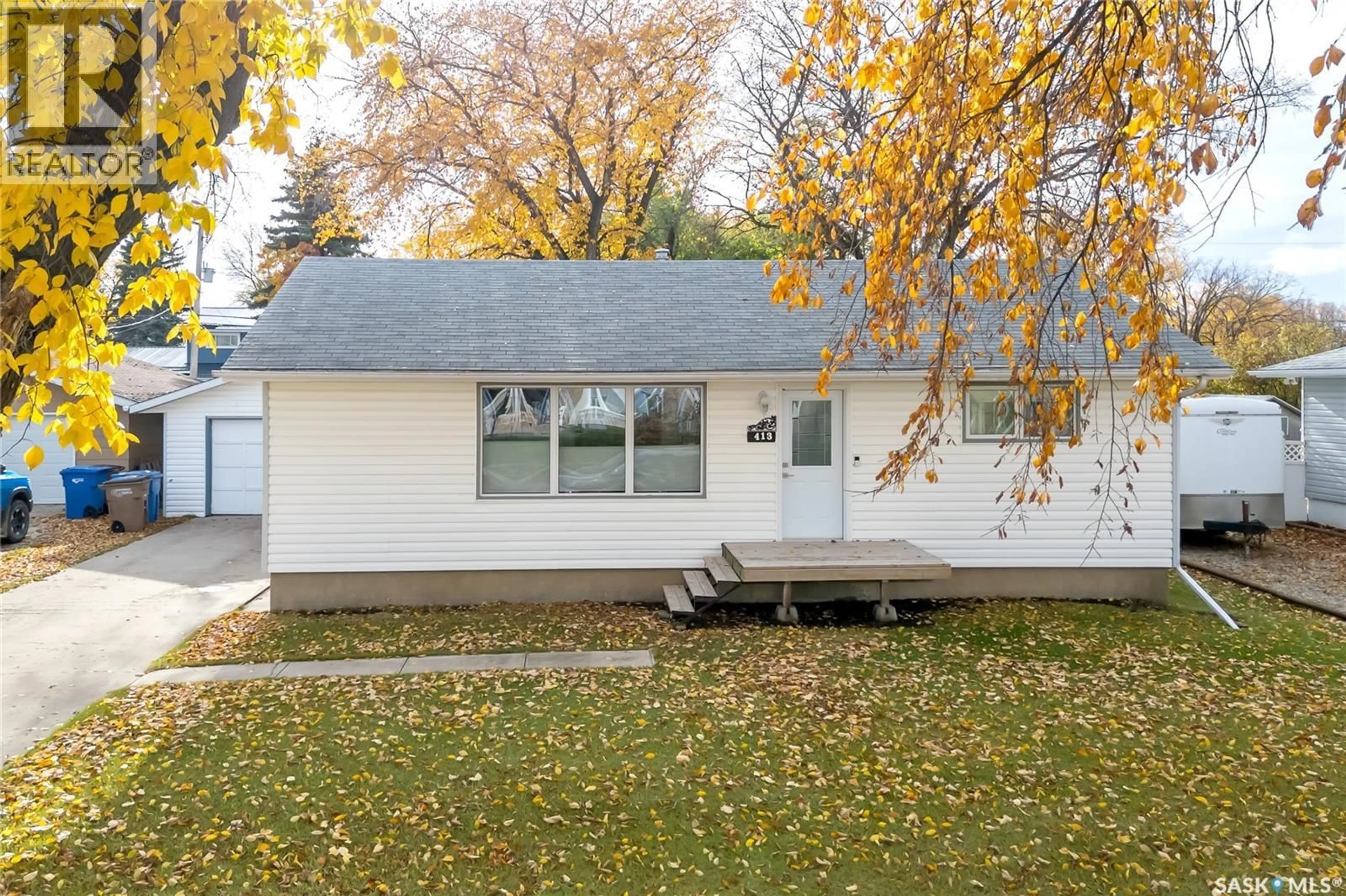 Home with vinyl exterior material, street for 413 BEMISTER AVENUE, Melfort Saskatchewan S0E1A0