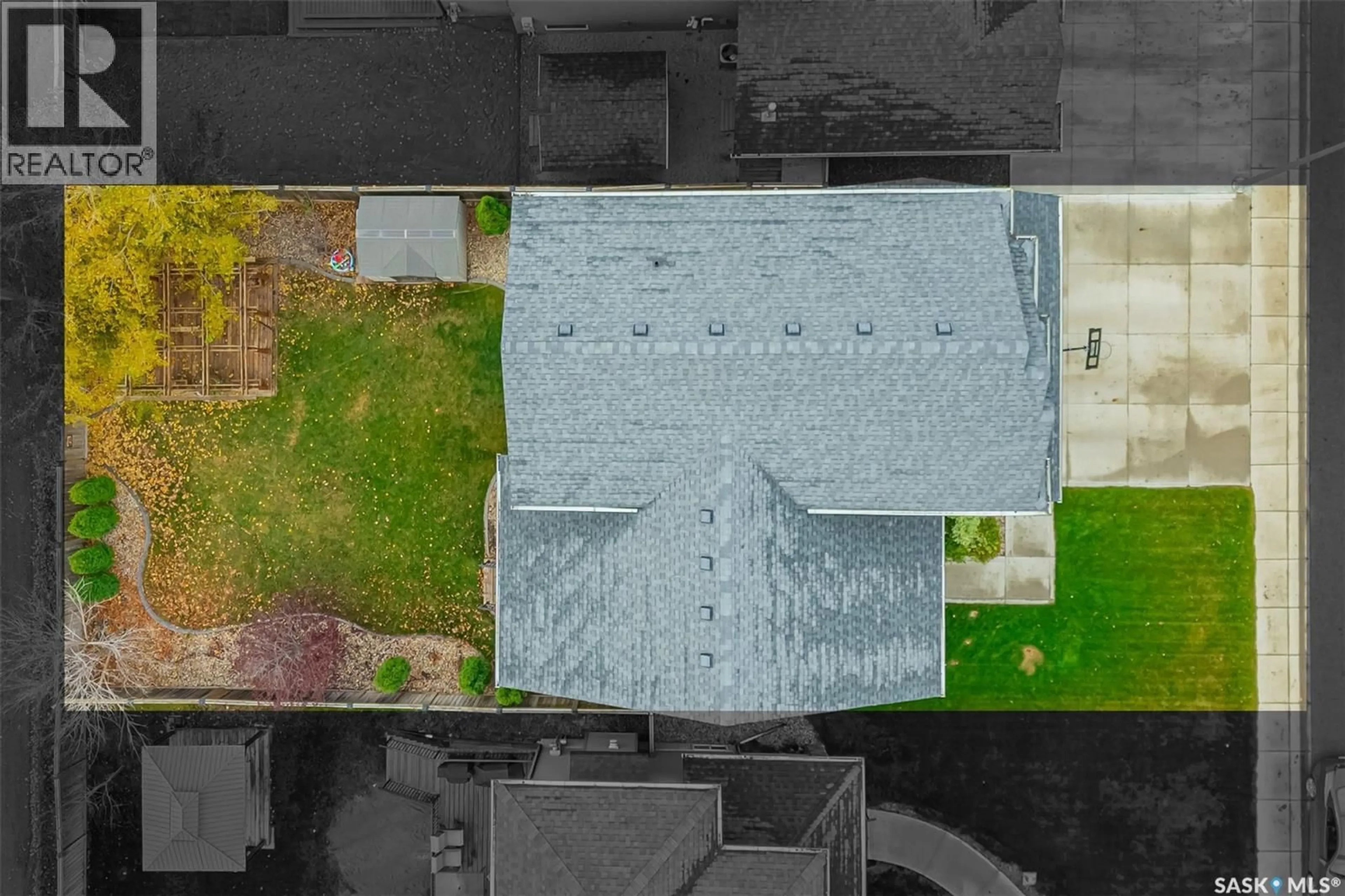 A pic from outside/outdoor area/front of a property/back of a property/a pic from drone, street for 523 REDWOOD DRIVE, Warman Saskatchewan S0K4S2