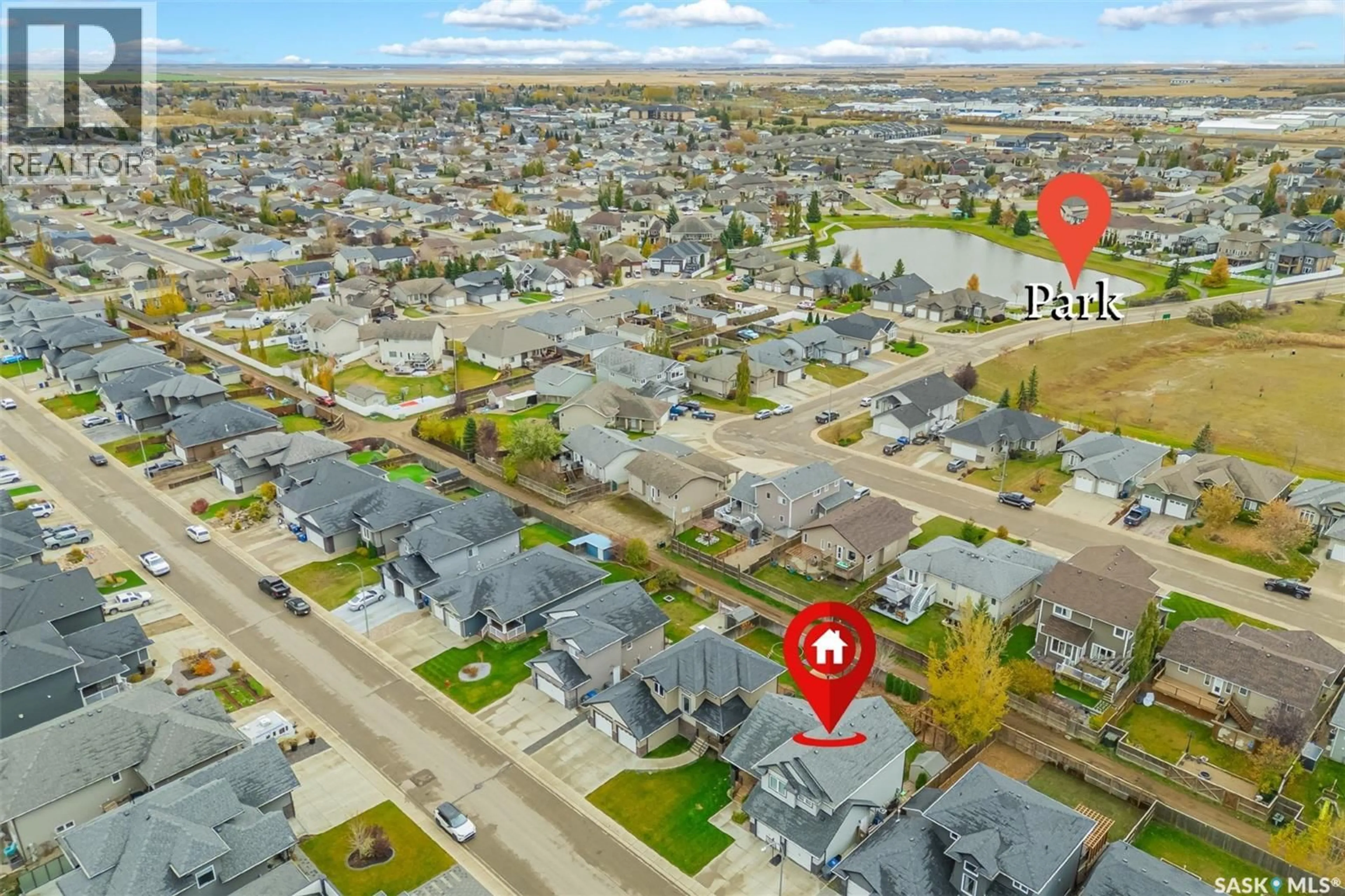 A pic from outside/outdoor area/front of a property/back of a property/a pic from drone, street for 523 REDWOOD DRIVE, Warman Saskatchewan S0K4S2