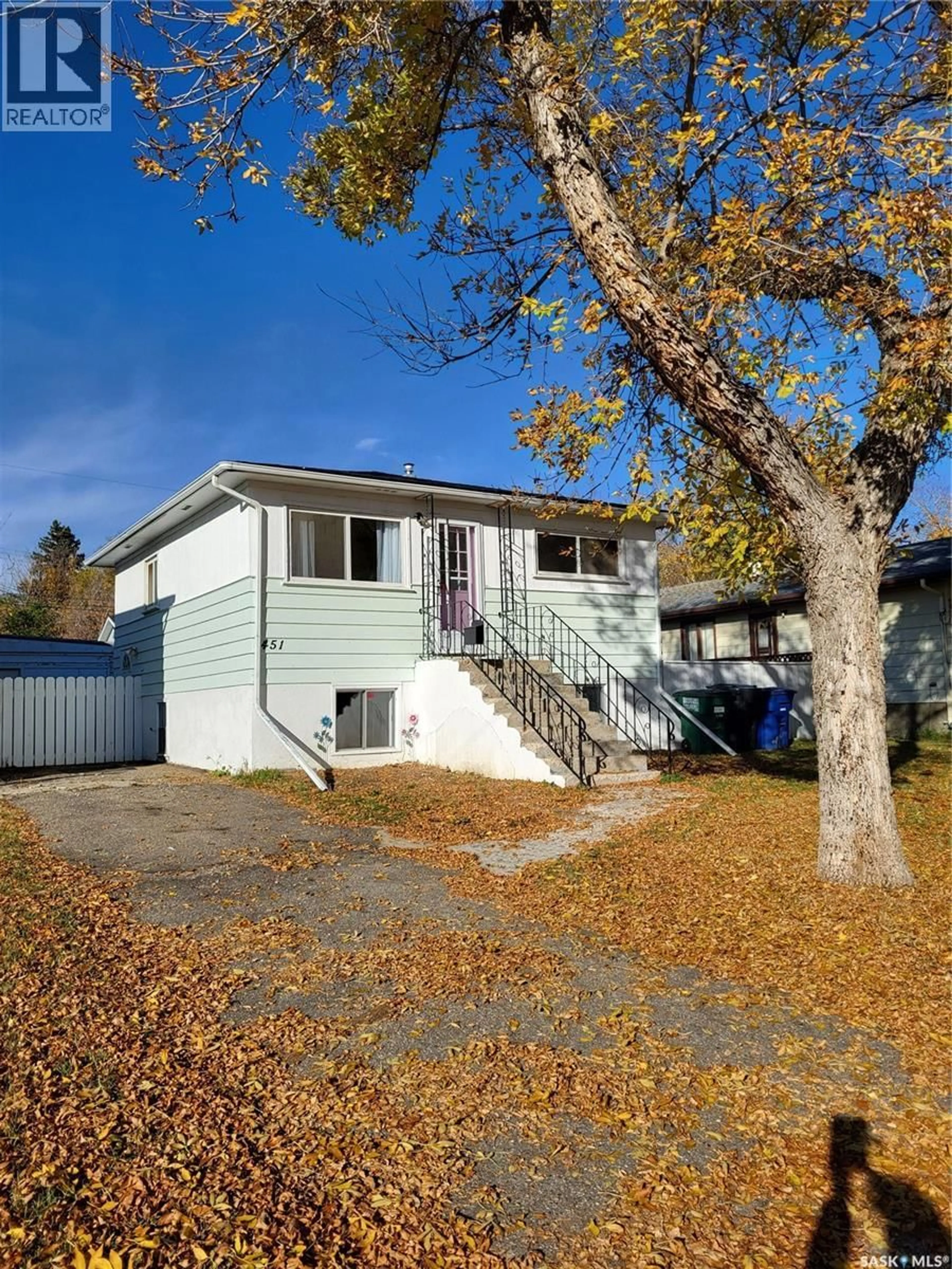 Home with vinyl exterior material, street for 451 S AVENUE S, Saskatoon Saskatchewan S7M3A3
