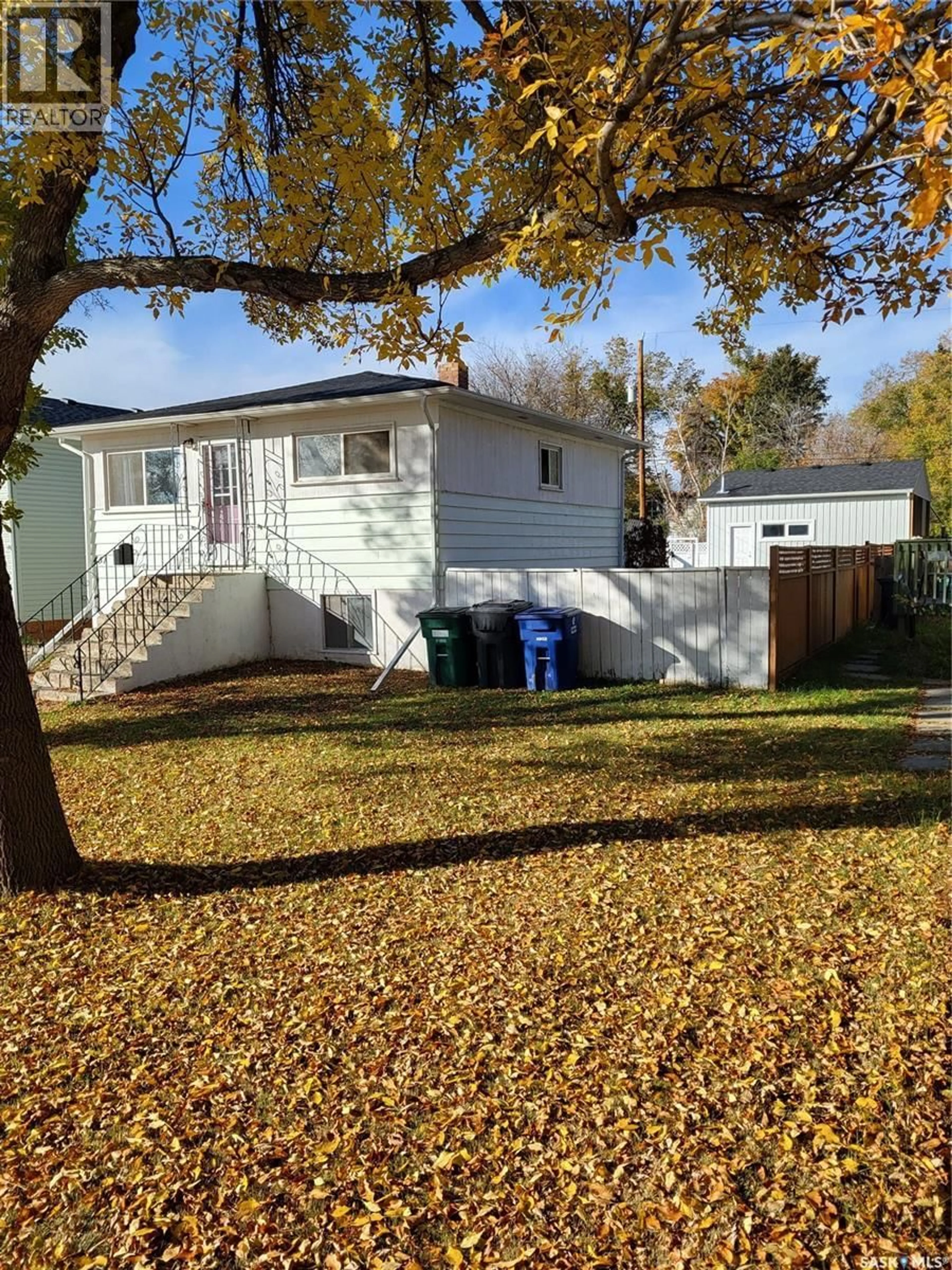 Home with vinyl exterior material, street for 451 S AVENUE S, Saskatoon Saskatchewan S7M3A3