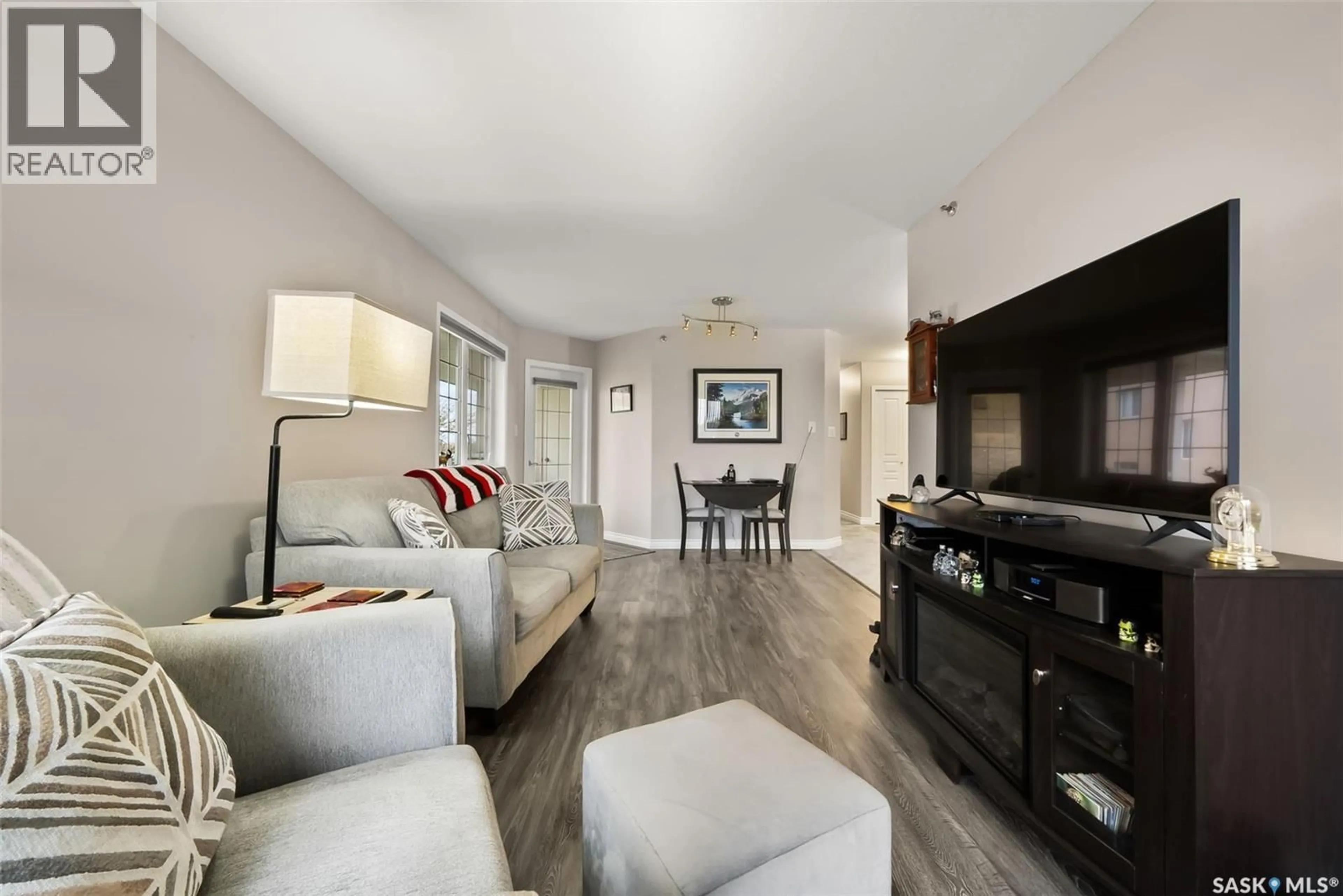 Living room with furniture, unknown for 404 28 KLEISINGER CRESCENT, Regina Saskatchewan S4R8T8