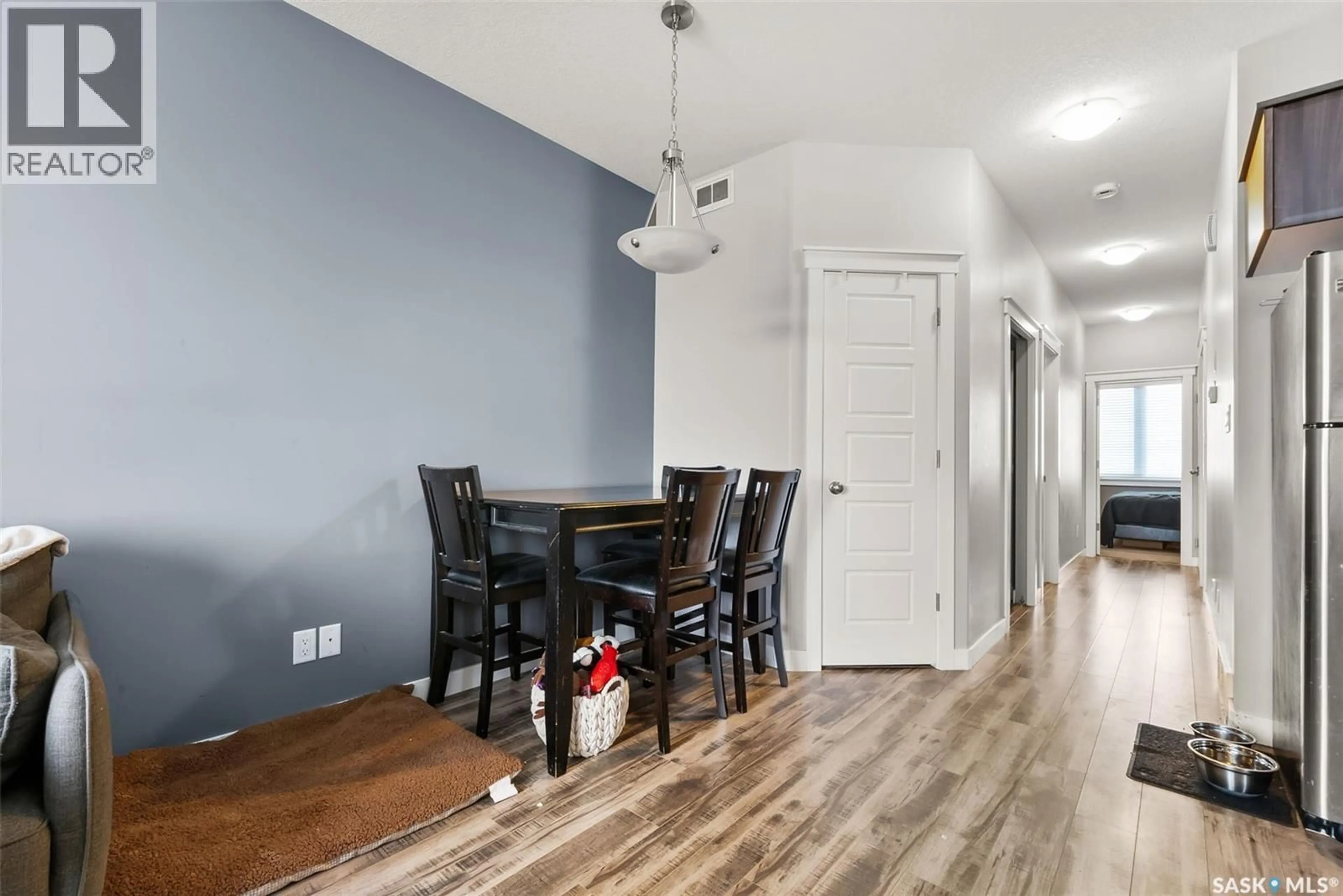 Dining room, wood/laminate floor for 6246 LITTLE PINE LOOP, Regina Saskatchewan S4X0J2