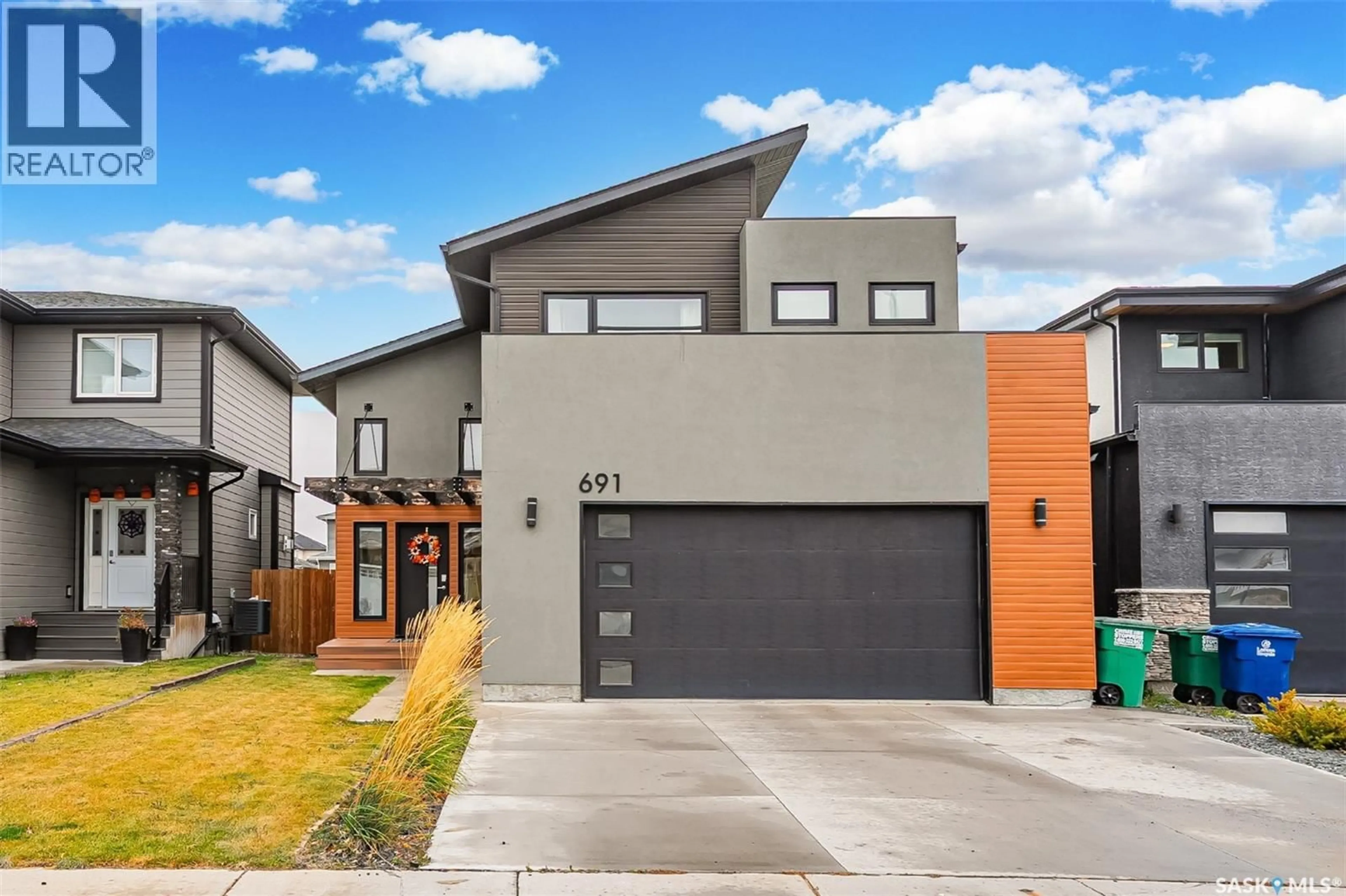 Home with brick exterior material, street for 691 FAST CRESCENT, Saskatoon Saskatchewan S7W0X1