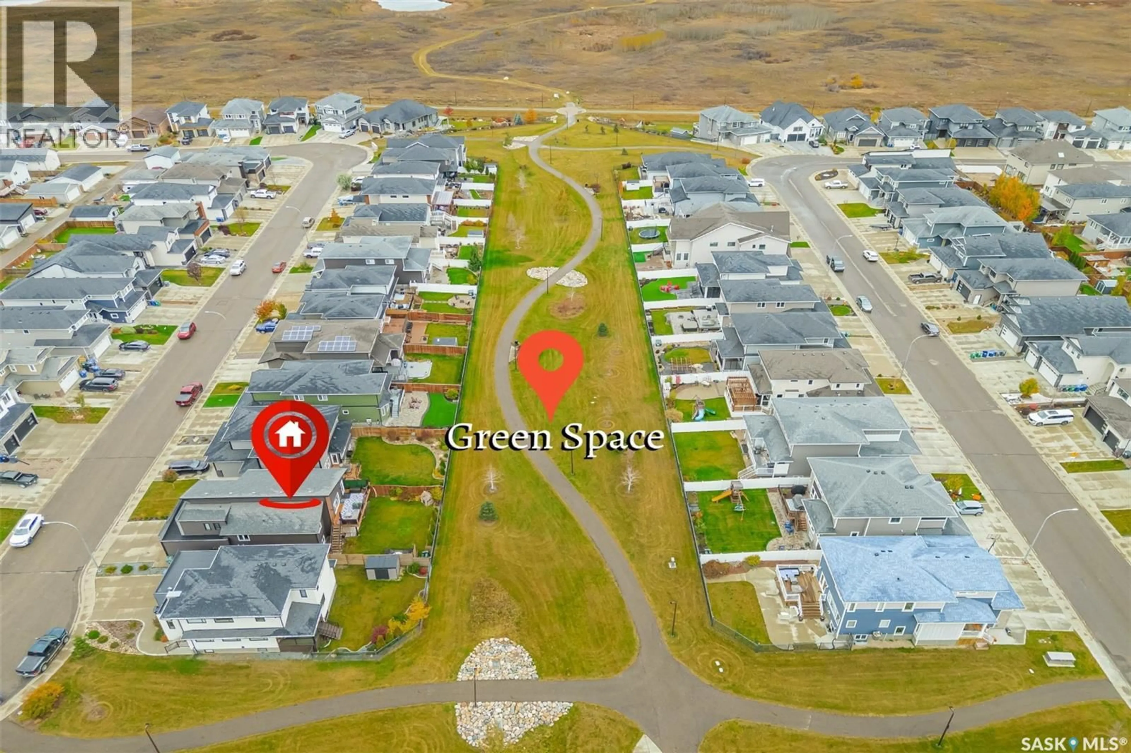 A pic from outside/outdoor area/front of a property/back of a property/a pic from drone, street for 691 FAST CRESCENT, Saskatoon Saskatchewan S7W0X1