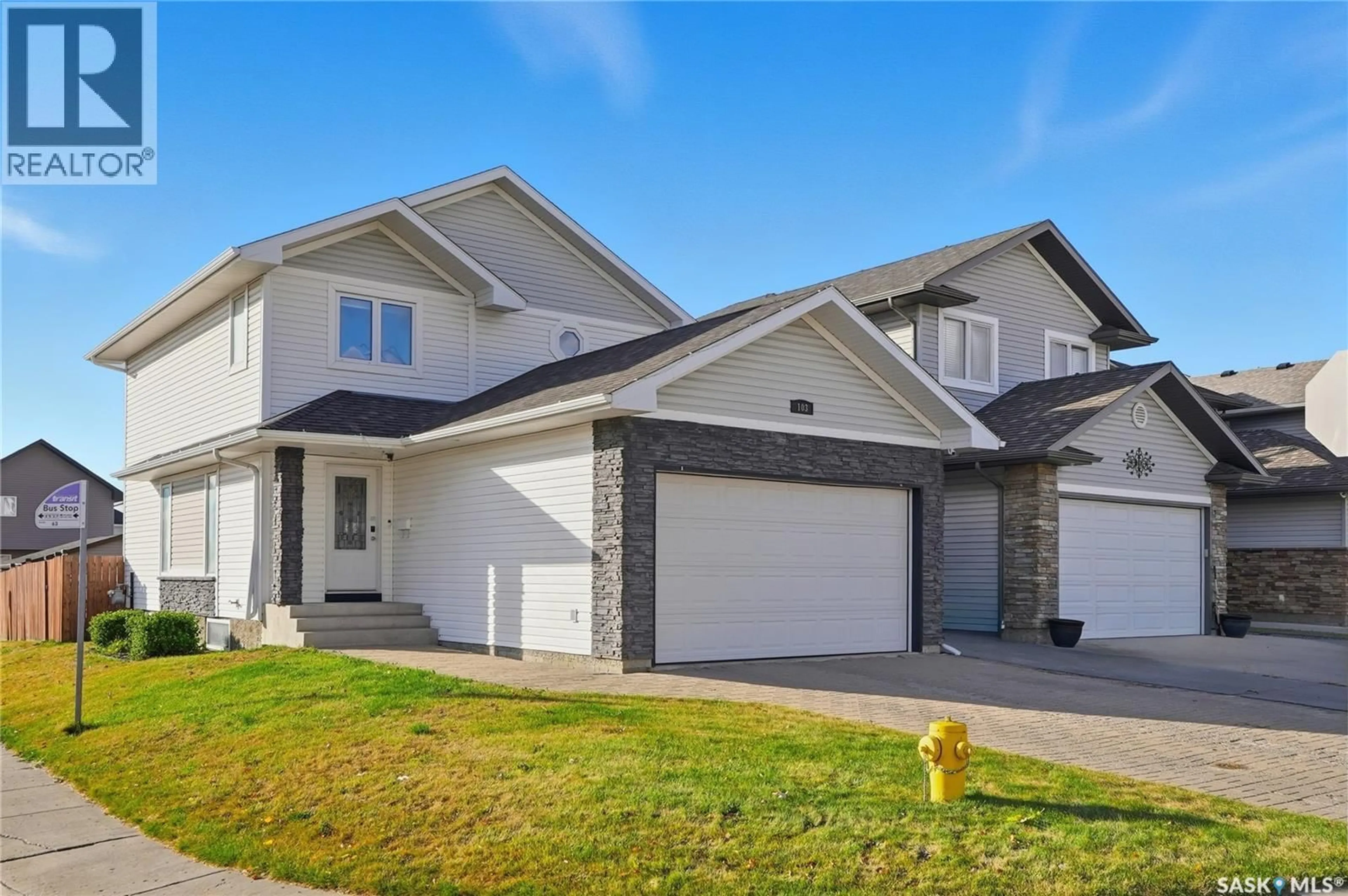 Home with vinyl exterior material, street for 103 KOROL CRESCENT, Saskatoon Saskatchewan S7R0E1