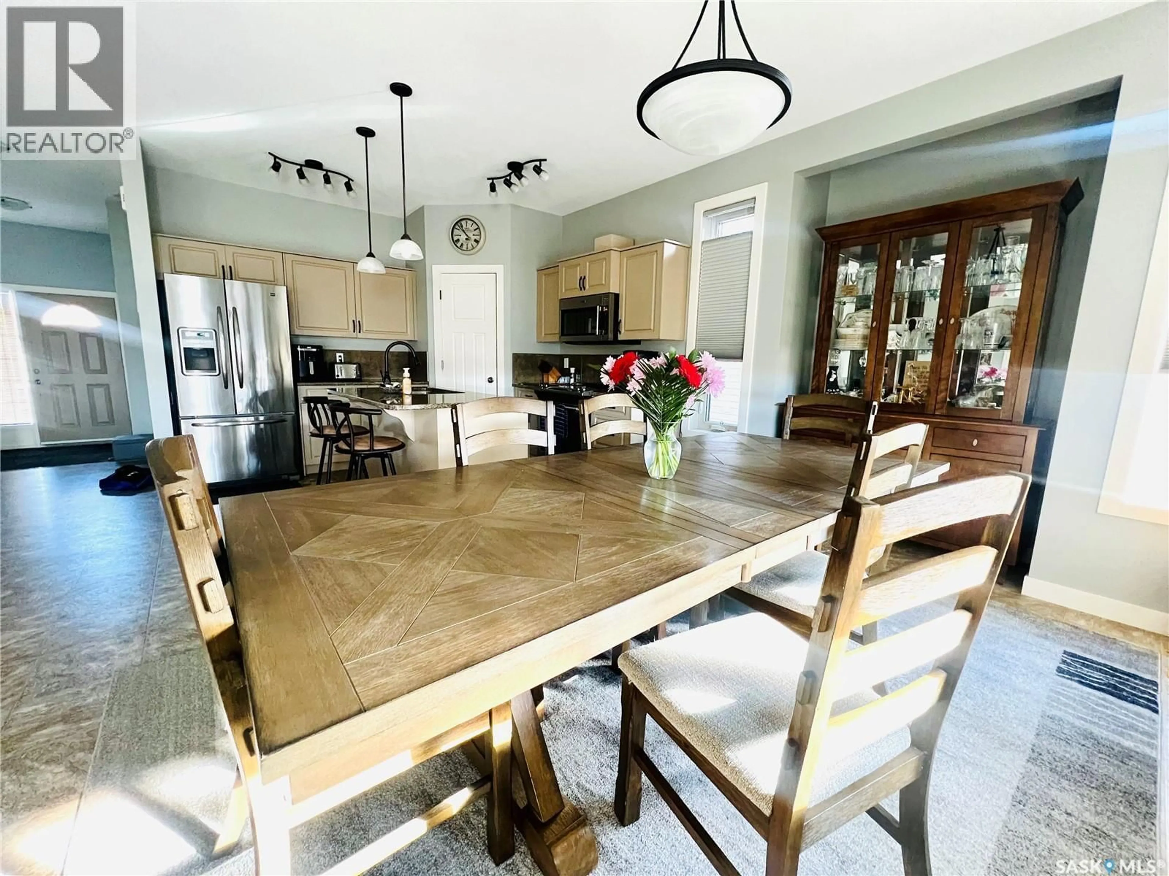Open concept kitchen, ceramic/tile floor for 104 VALLEY PARK PLACE, Swift Current Saskatchewan S9H5N2
