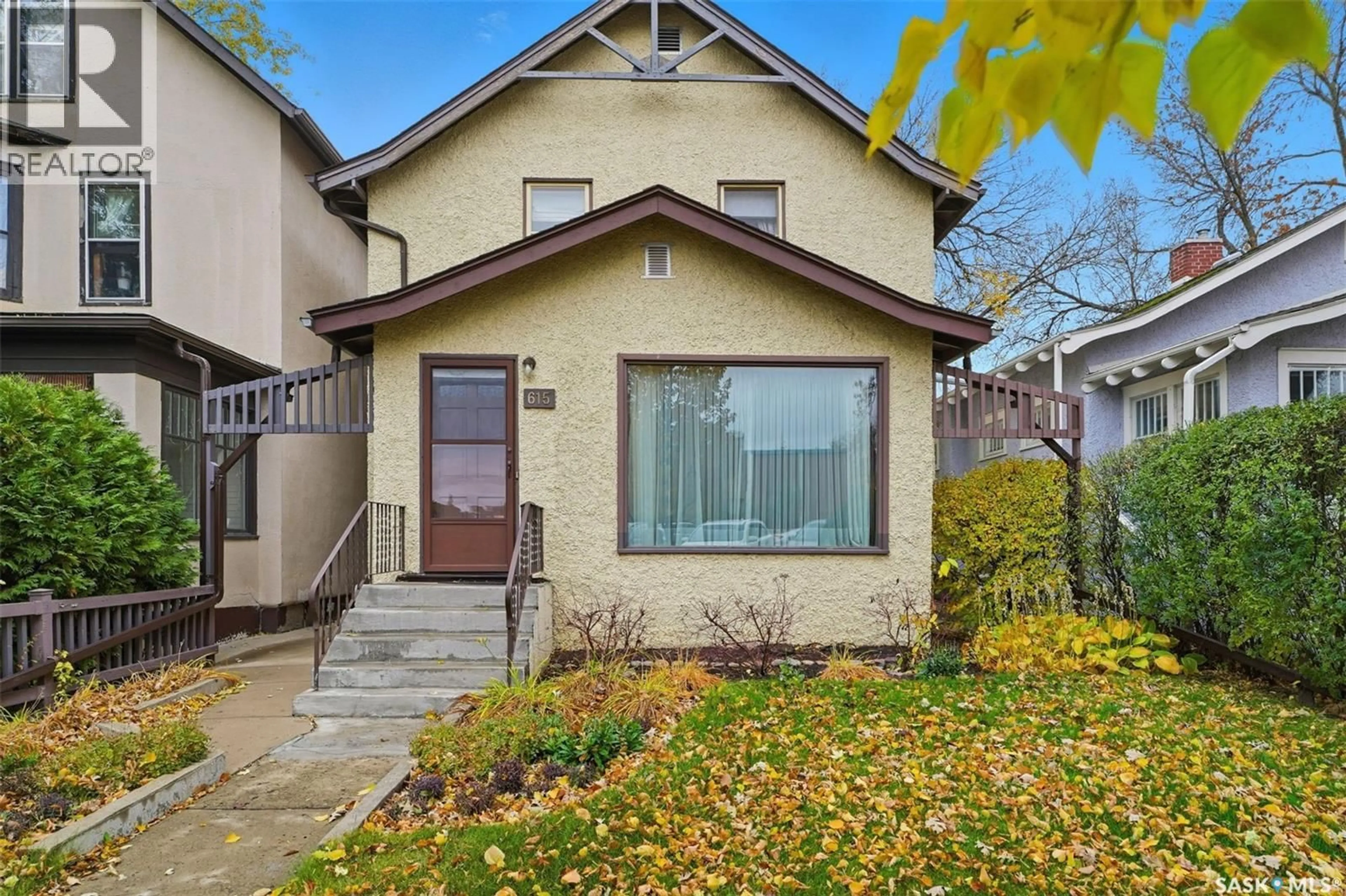 Home with vinyl exterior material, street for 615 EASTLAKE AVENUE, Saskatoon Saskatchewan S7N1A1