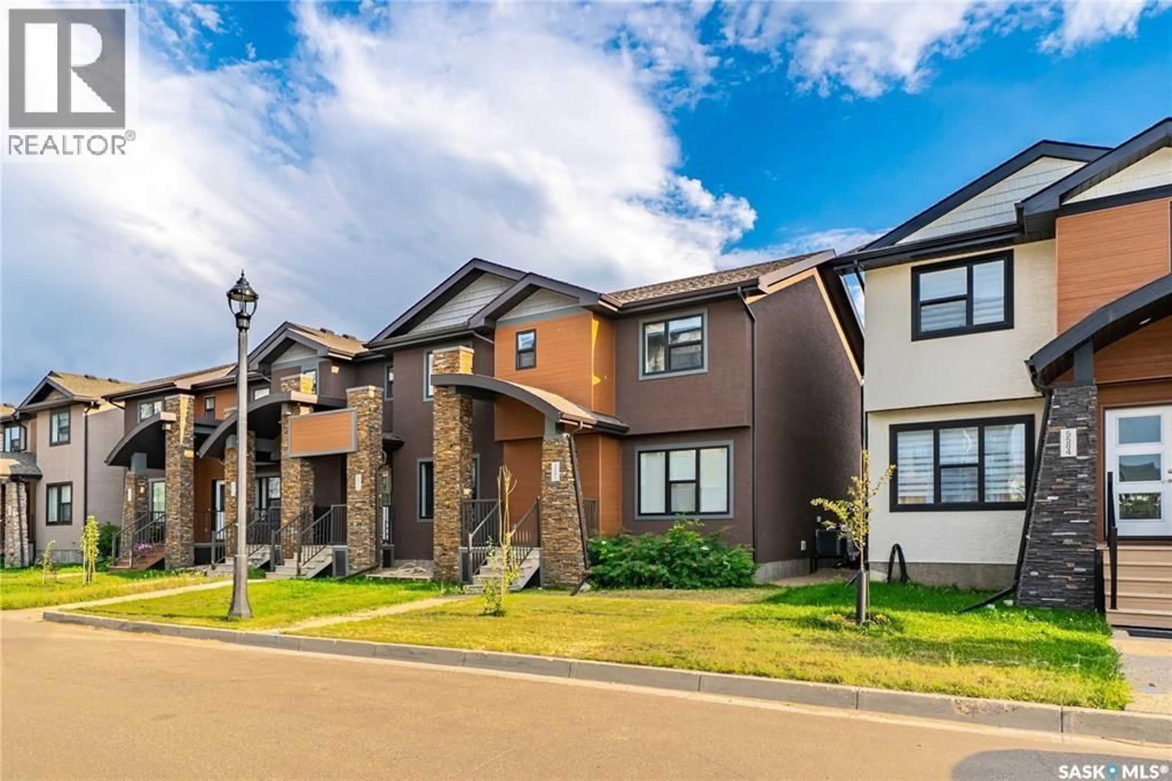 Home with brick exterior material, street for 5580 MCKENNA ROAD, Regina Saskatchewan S4W0N6