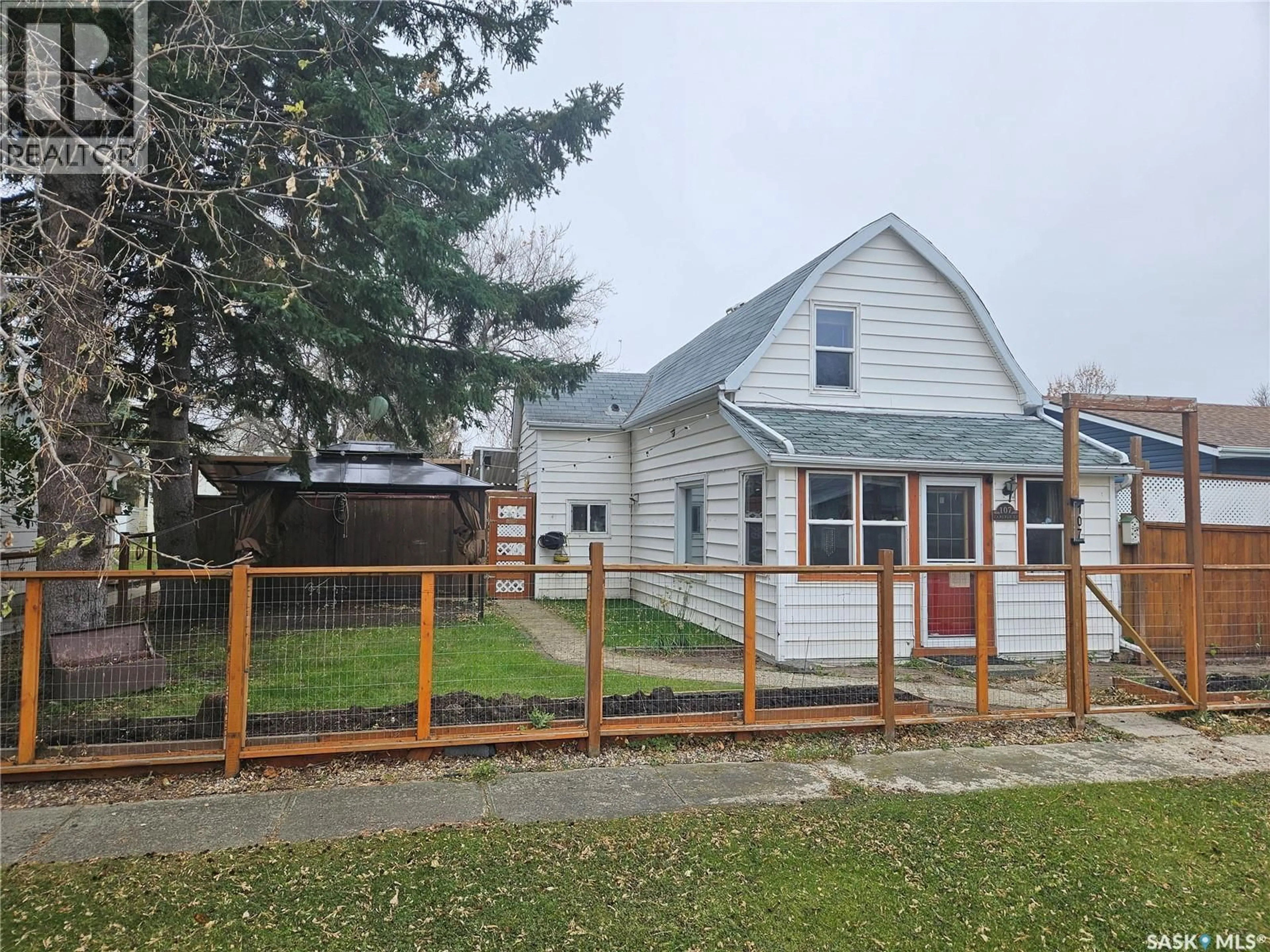 A pic from outside/outdoor area/front of a property/back of a property/a pic from drone, street for 107 CARLYLE STREET, Arcola Saskatchewan S0C0G0