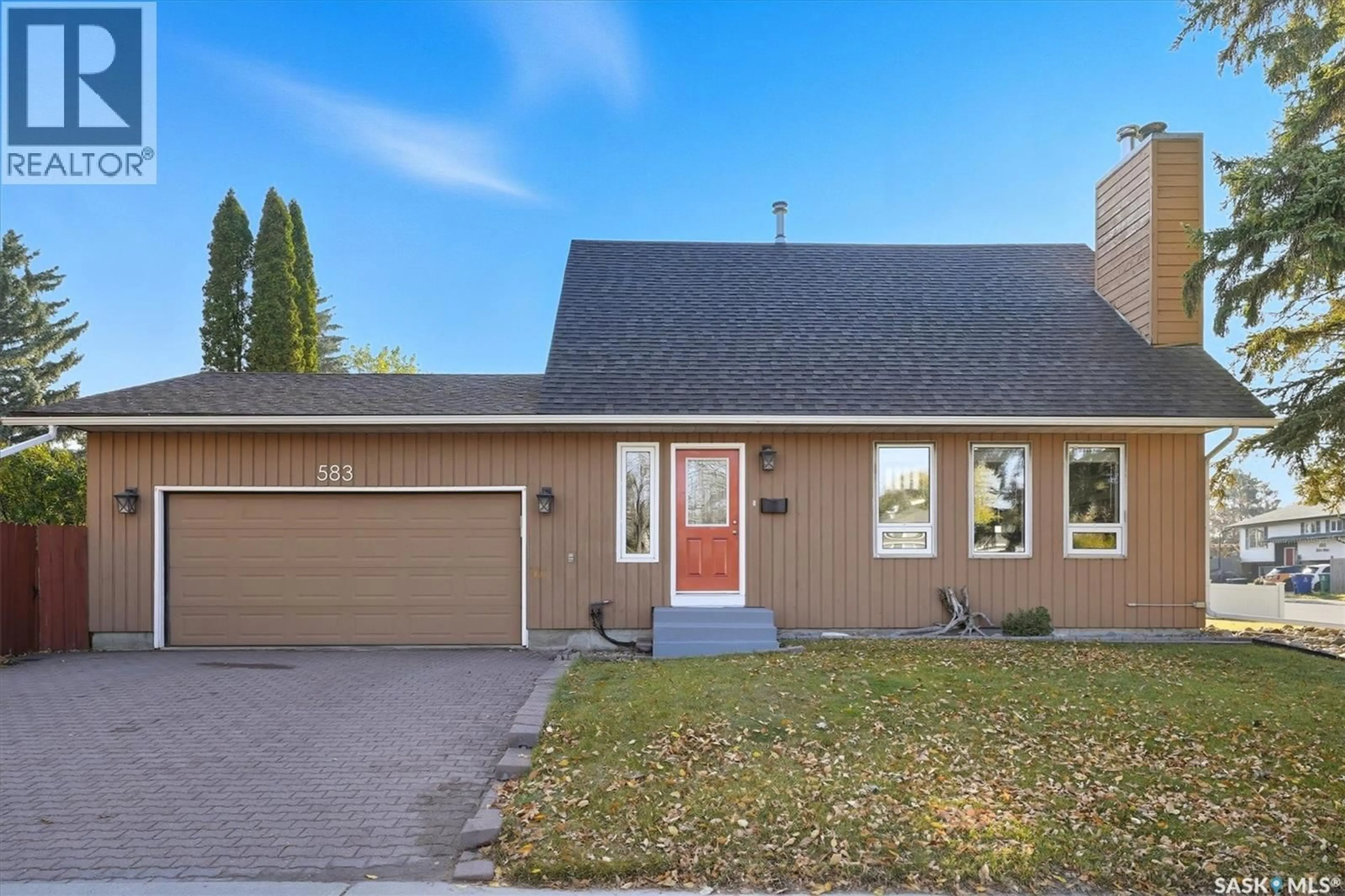 Home with vinyl exterior material, street for 583 TOBIN CRESCENT, Saskatoon Saskatchewan S7K4N9