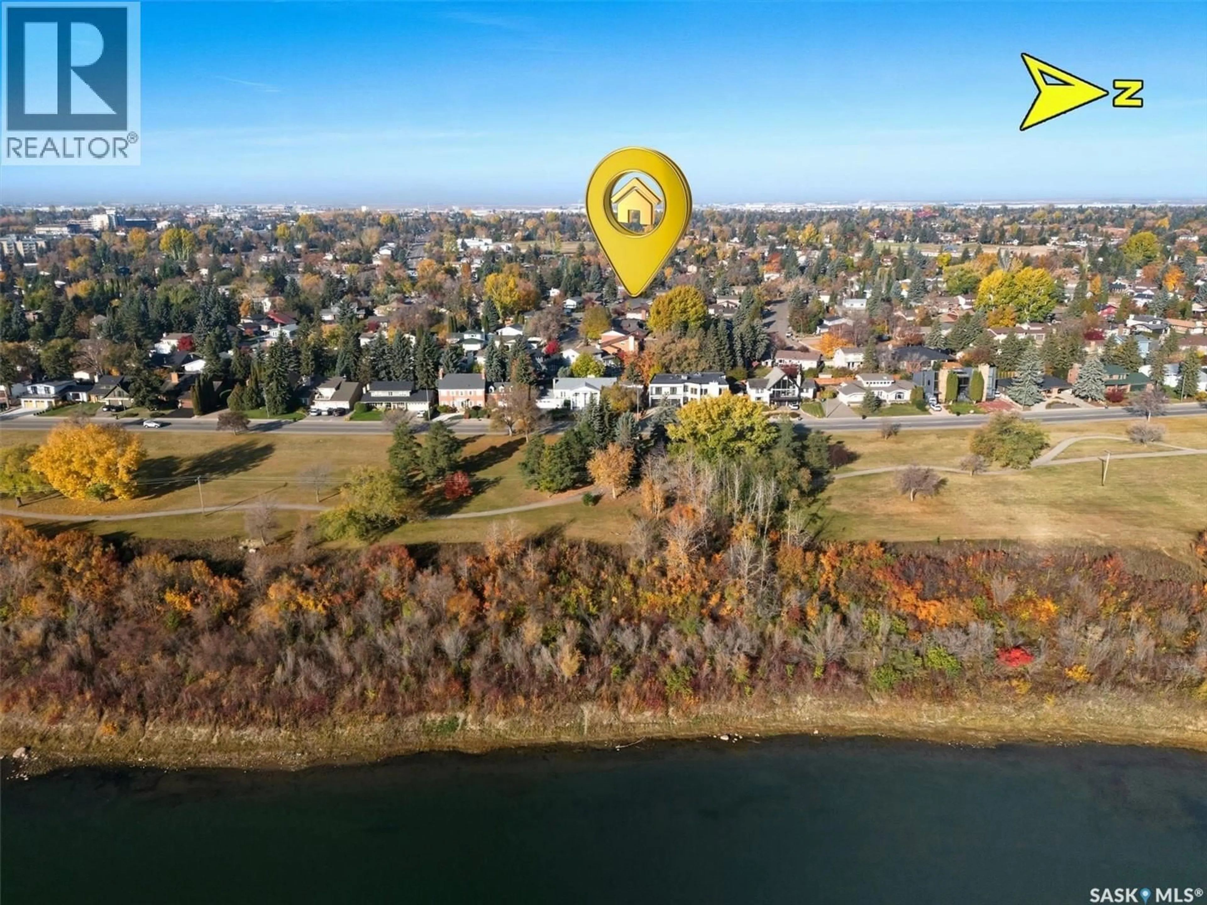 A pic from outside/outdoor area/front of a property/back of a property/a pic from drone, water/lake/river/ocean view for 583 TOBIN CRESCENT, Saskatoon Saskatchewan S7K4N9