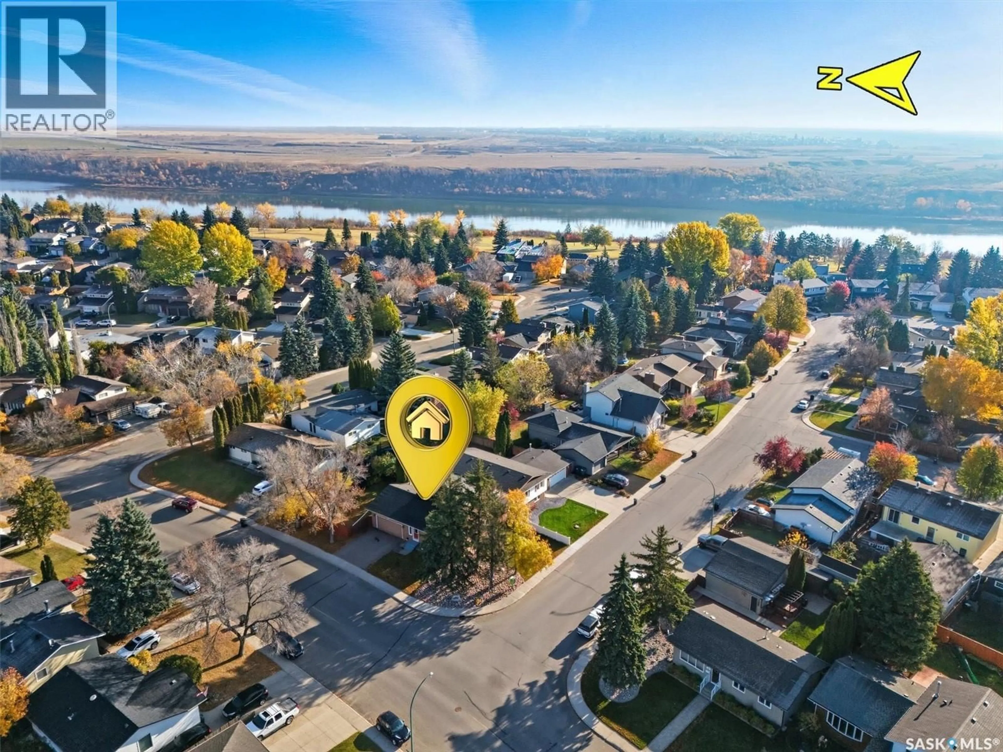 A pic from outside/outdoor area/front of a property/back of a property/a pic from drone, unknown for 583 TOBIN CRESCENT, Saskatoon Saskatchewan S7K4N9