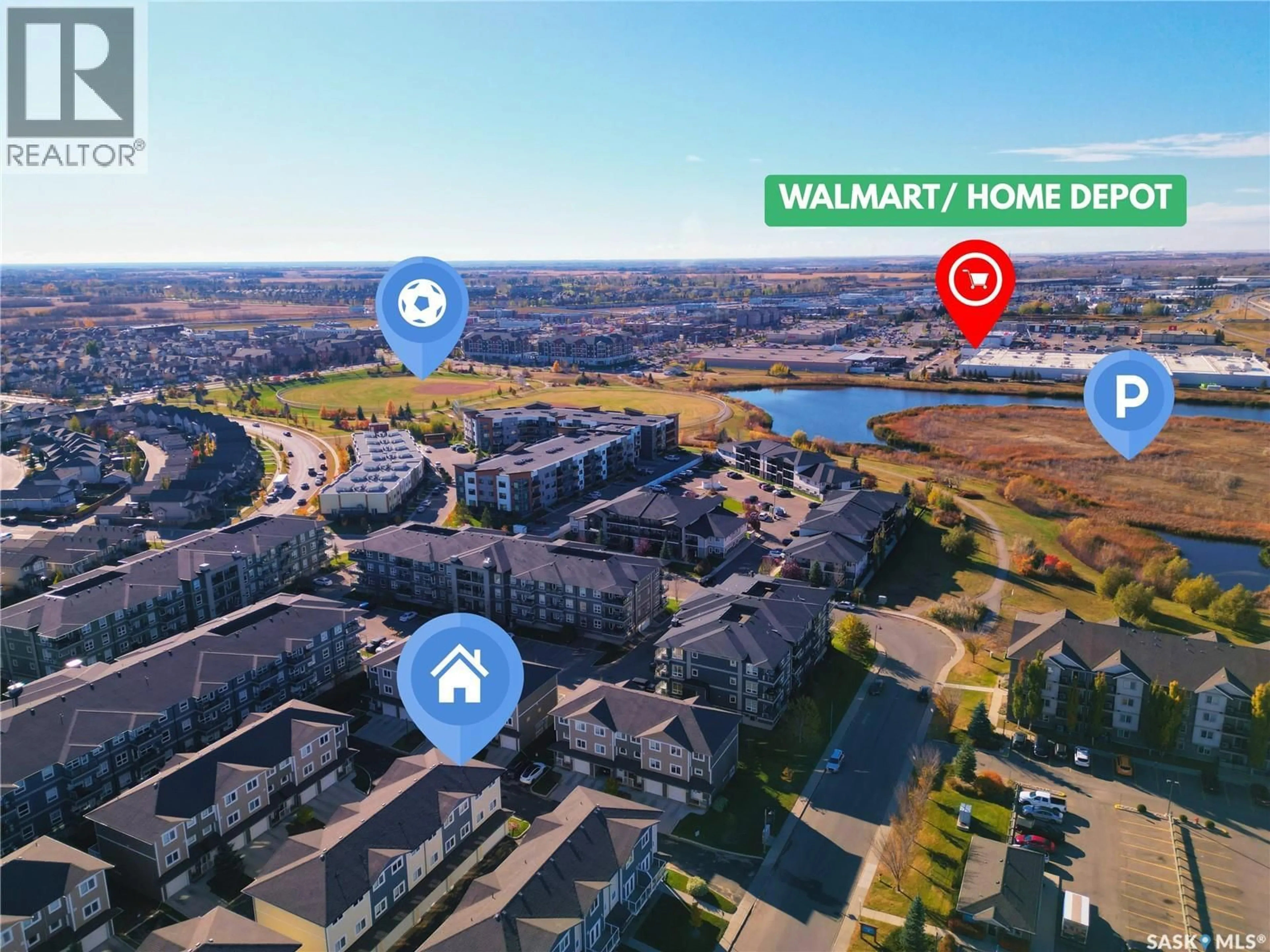 A pic from outside/outdoor area/front of a property/back of a property/a pic from drone, water/lake/river/ocean view for 301 212 WILLIS CRESCENT, Saskatoon Saskatchewan S7T0R7