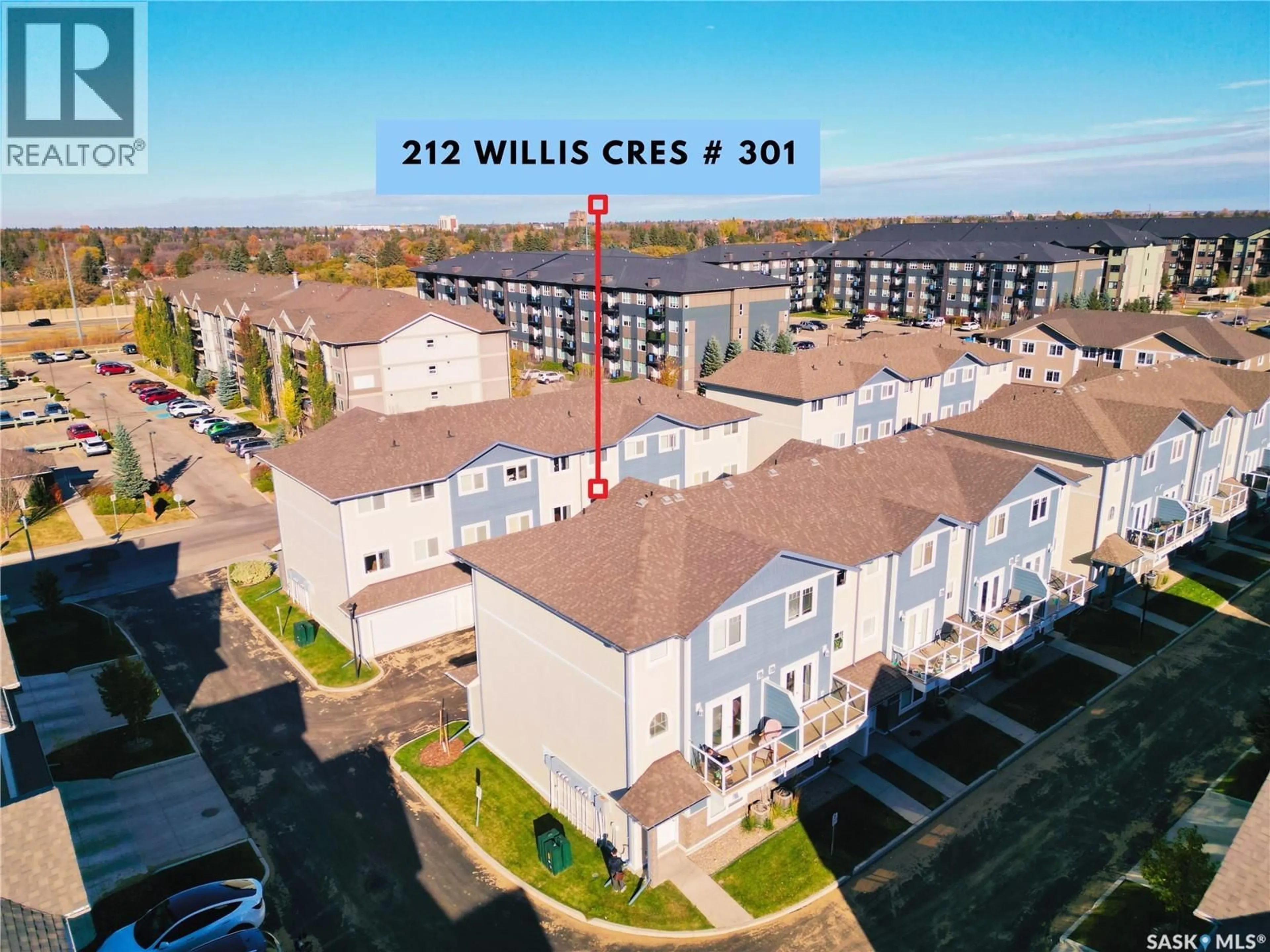 A pic from outside/outdoor area/front of a property/back of a property/a pic from drone, unknown for 301 212 WILLIS CRESCENT, Saskatoon Saskatchewan S7T0R7