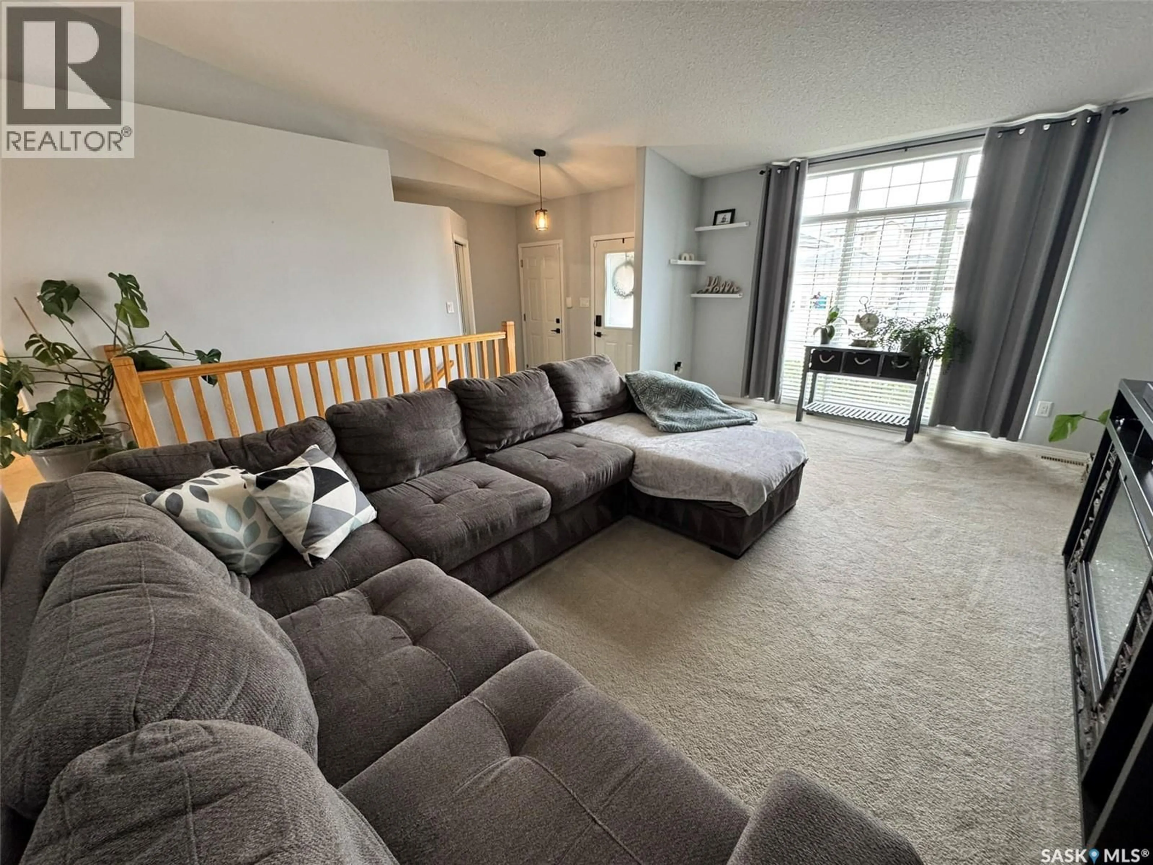 Living room with furniture, unknown for 7364 MAPLE VIEW CRESCENT, Regina Saskatchewan S4X4V2
