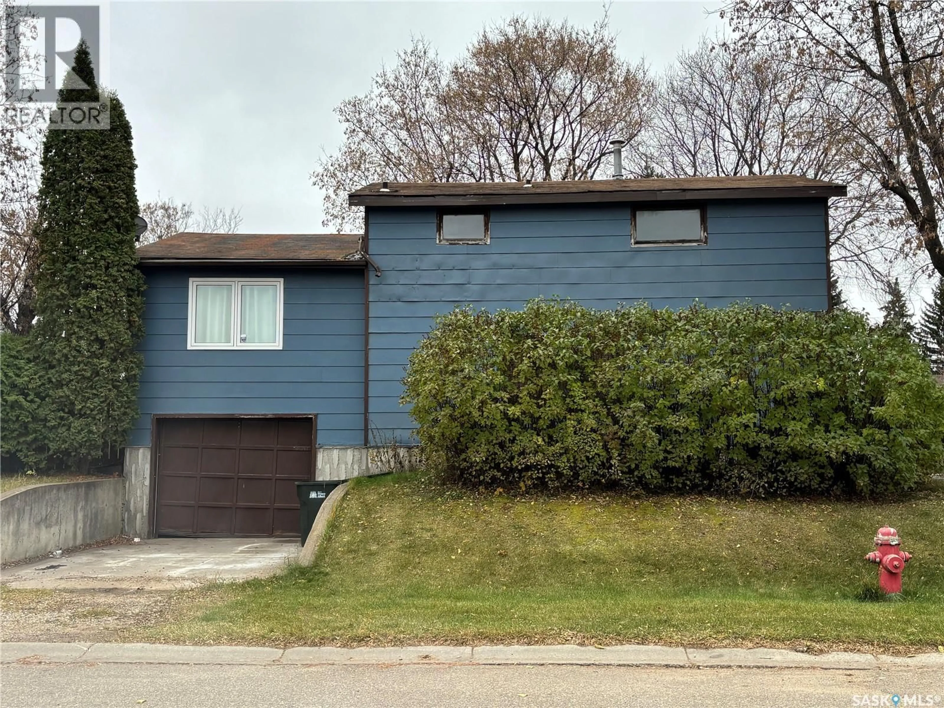 Home with vinyl exterior material, street for 1647 14TH STREET, Prince Albert Saskatchewan S6V3N6
