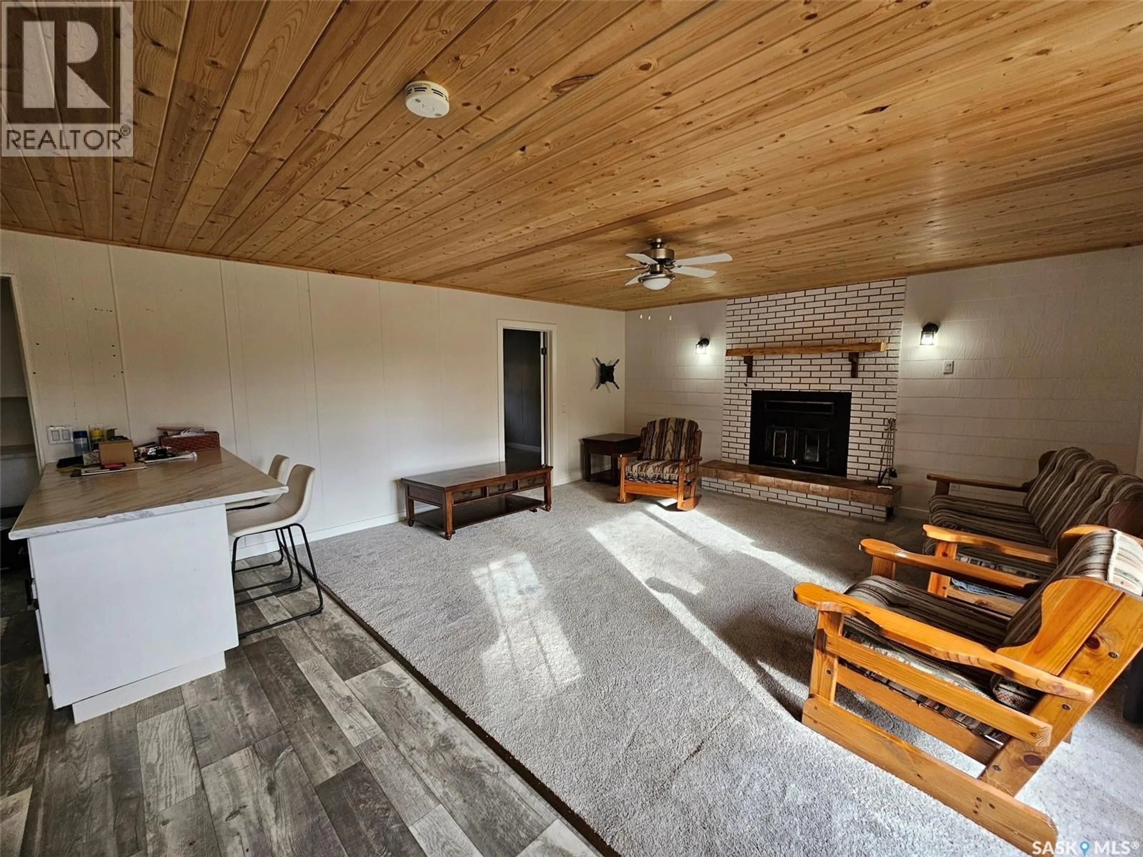 Living room with furniture, wood/laminate floor for 7 ASPEN CRESCENT, Moose Mountain Provincial Park Saskatchewan S0C2S0