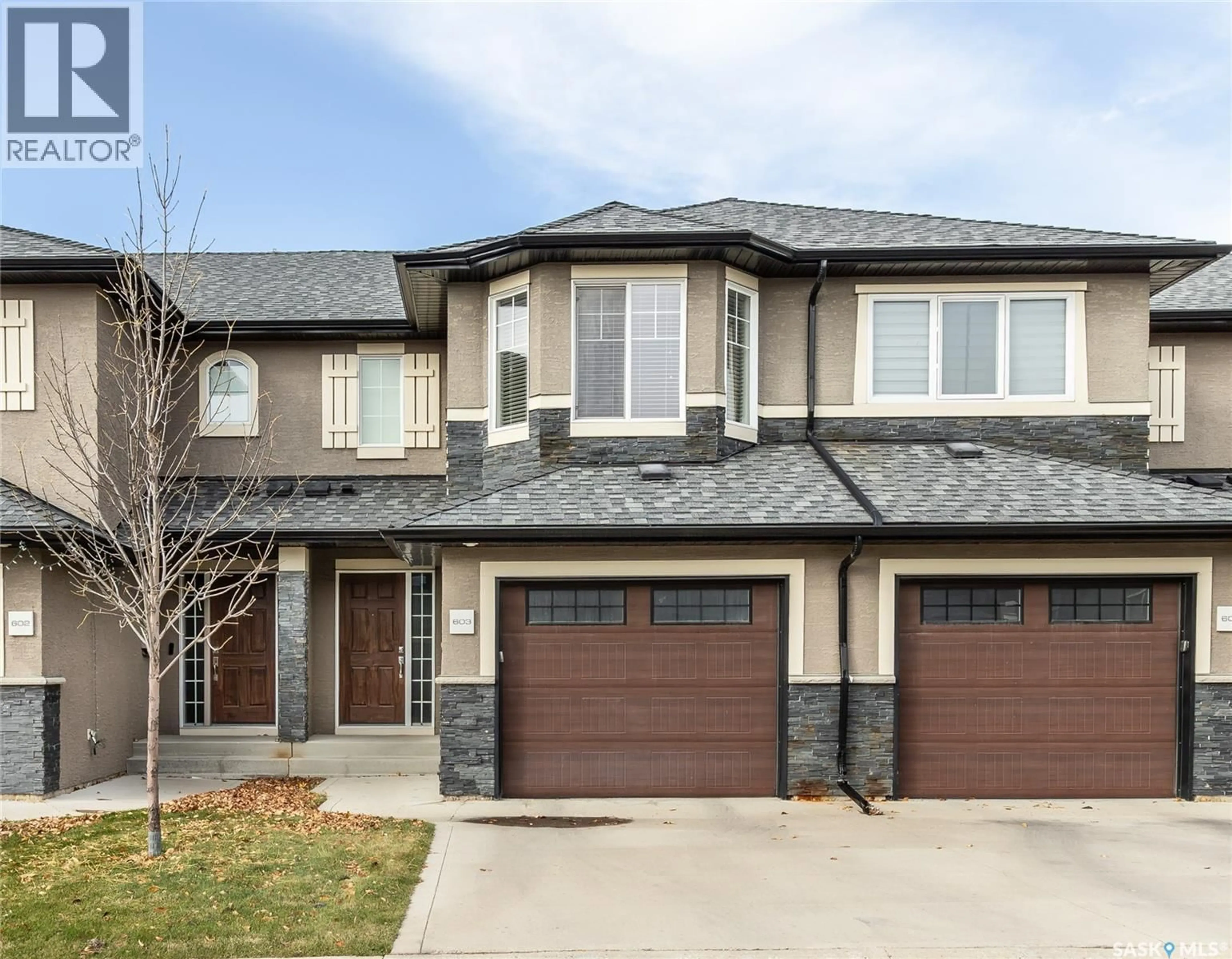 Home with brick exterior material, street for 603 455 REMPEL LANE, Saskatoon Saskatchewan S7T0R8