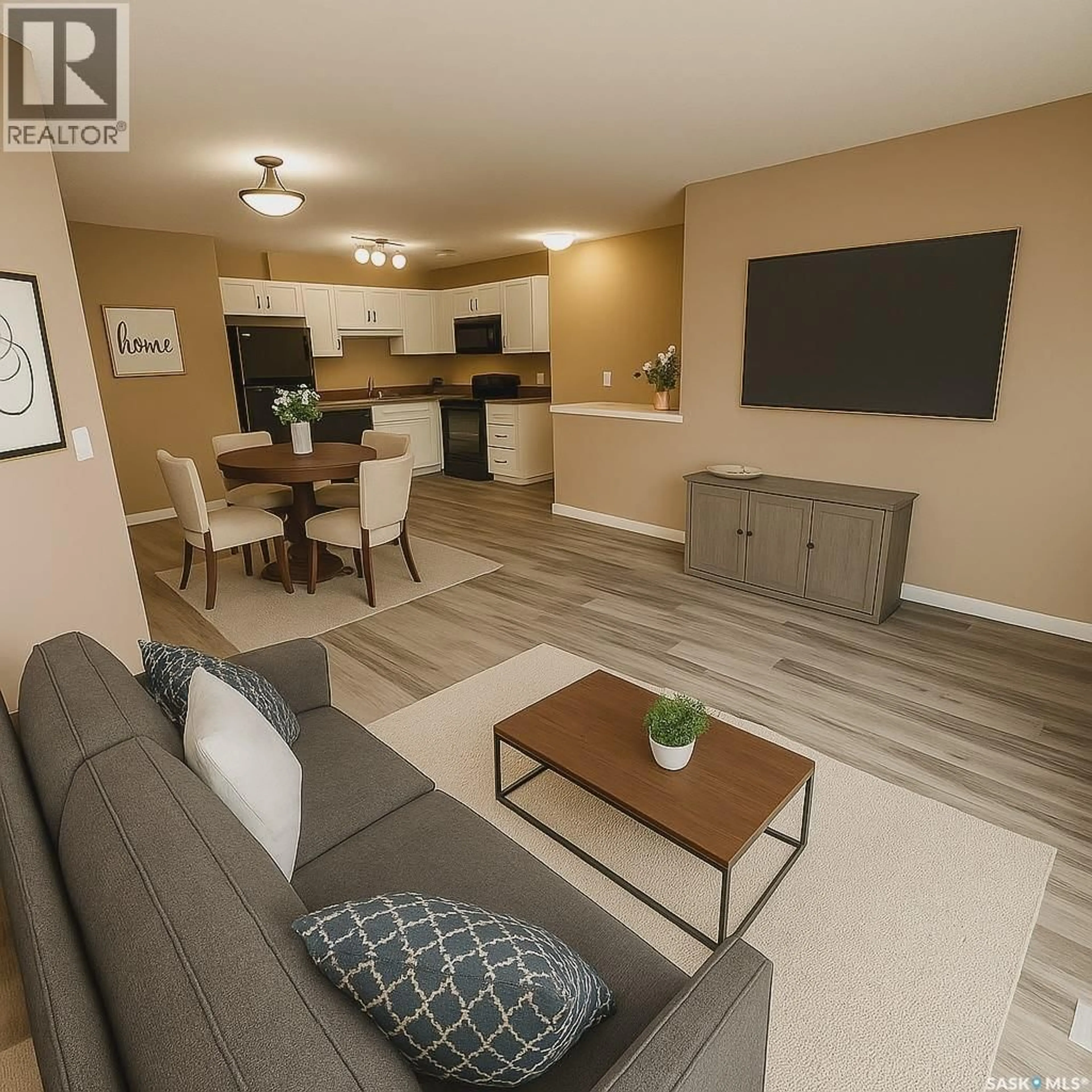 Living room with furniture, wood/laminate floor for 5642 - 93 GORDON ROAD, Regina Saskatchewan S4W0M1