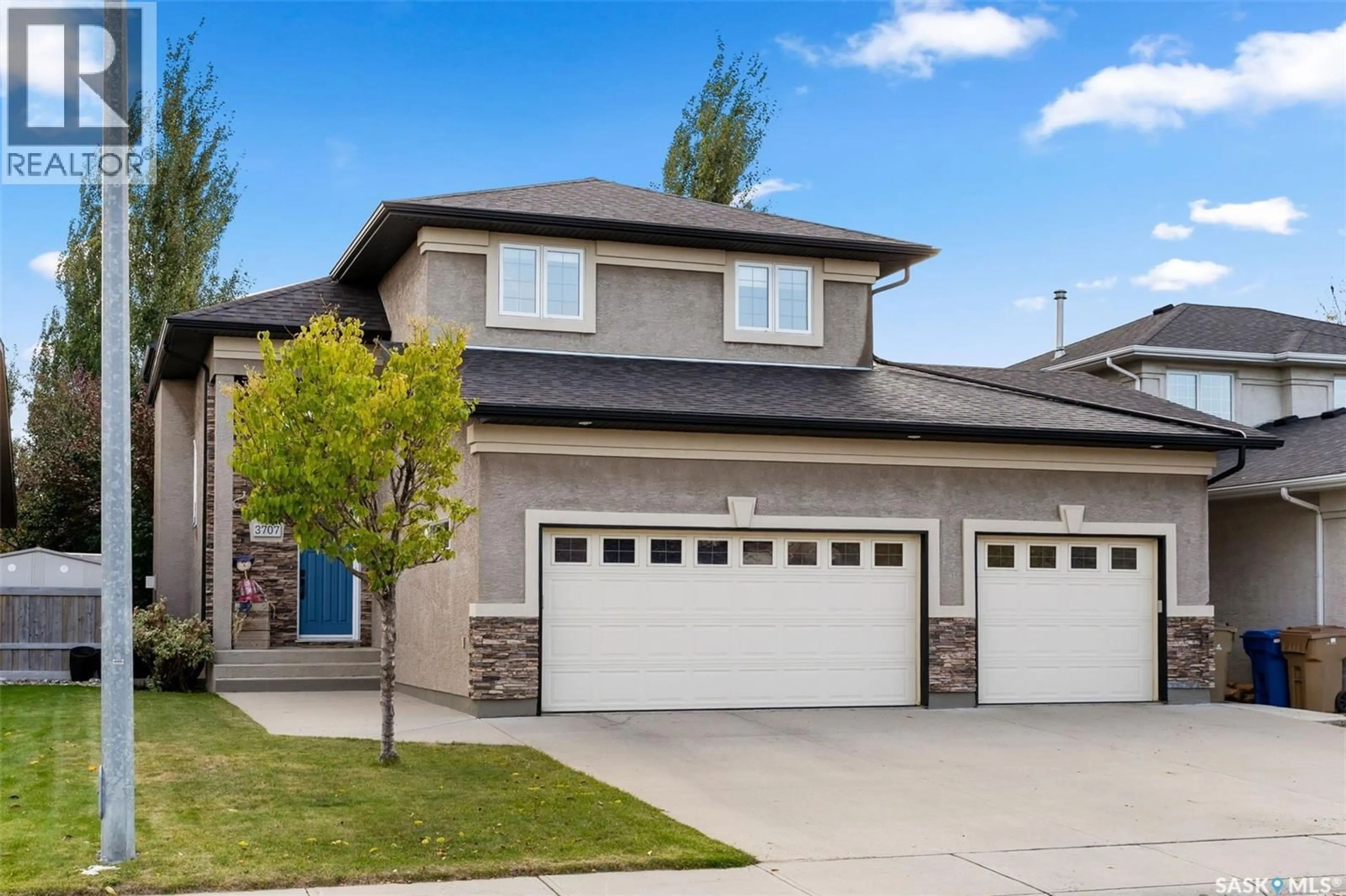 Home with vinyl exterior material, street for E - 3707 SANDRINGHAM ROAD, Regina Saskatchewan S4V3C4