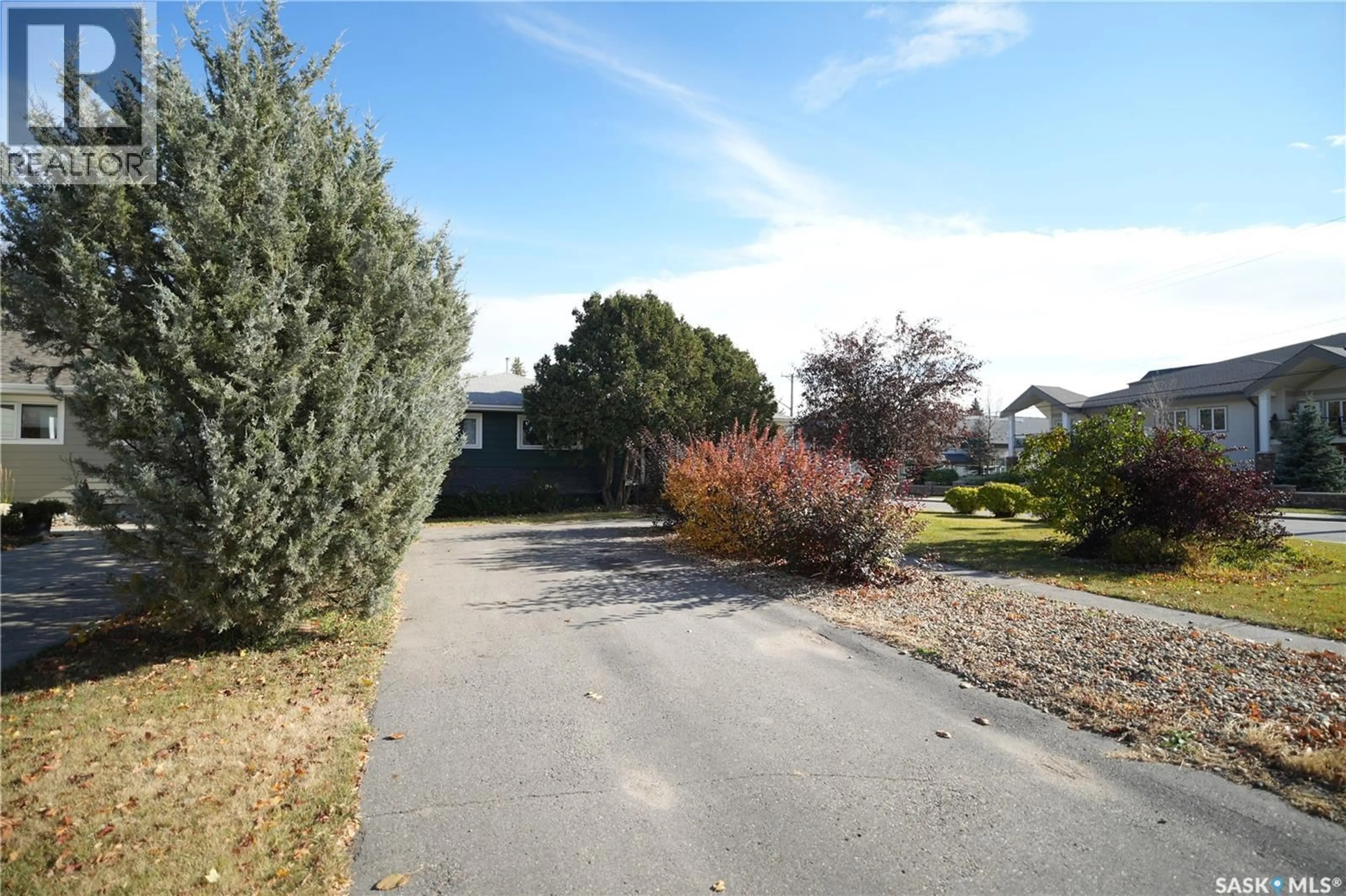 A pic from outside/outdoor area/front of a property/back of a property/a pic from drone, street for 2337 MCKINNON AVENUE, Saskatoon Saskatchewan S7J1N7