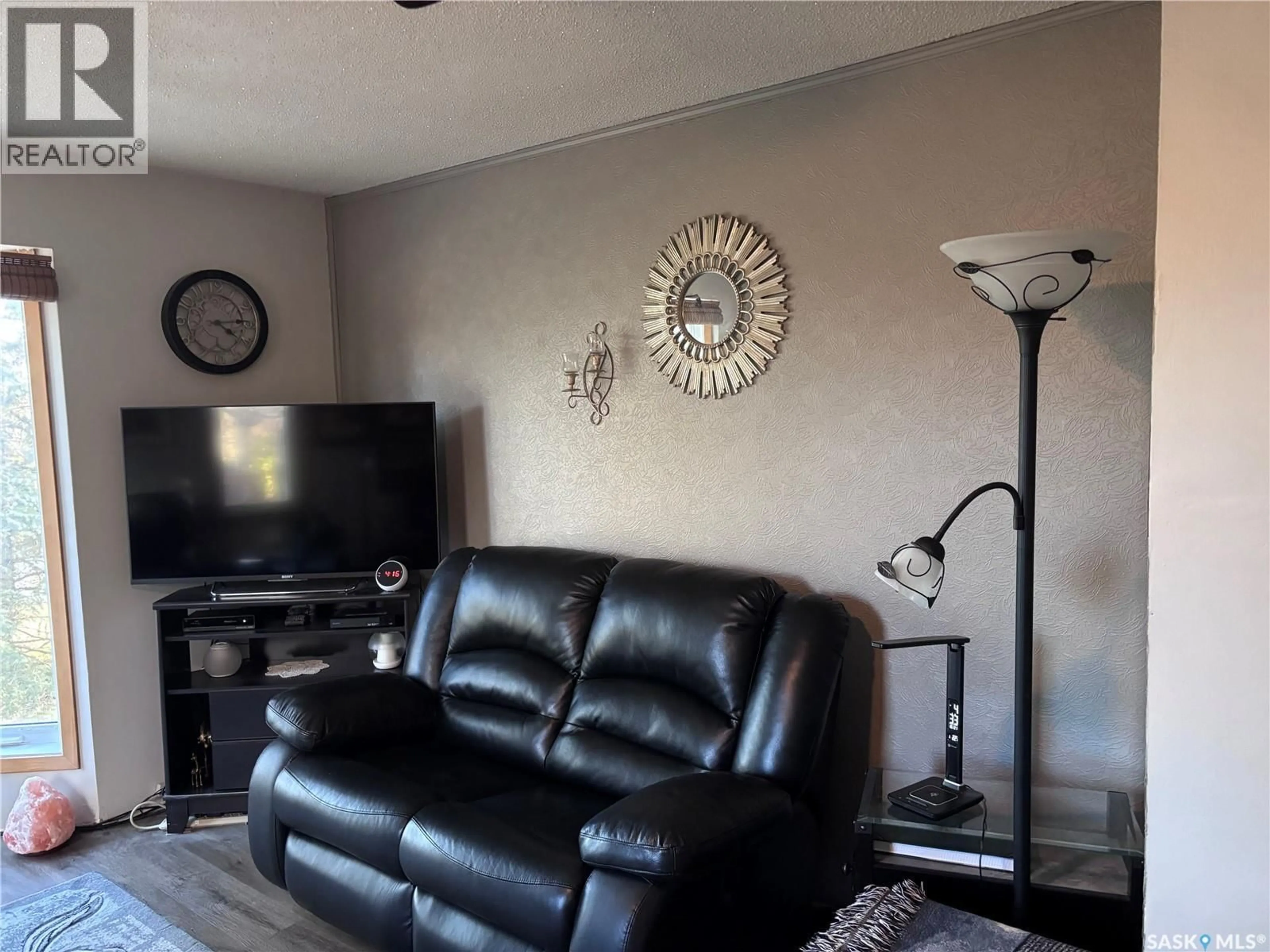 Living room with furniture, unknown for CATOR ACREAGE, Miry Creek Rm No. 229 Saskatchewan S0N0J0