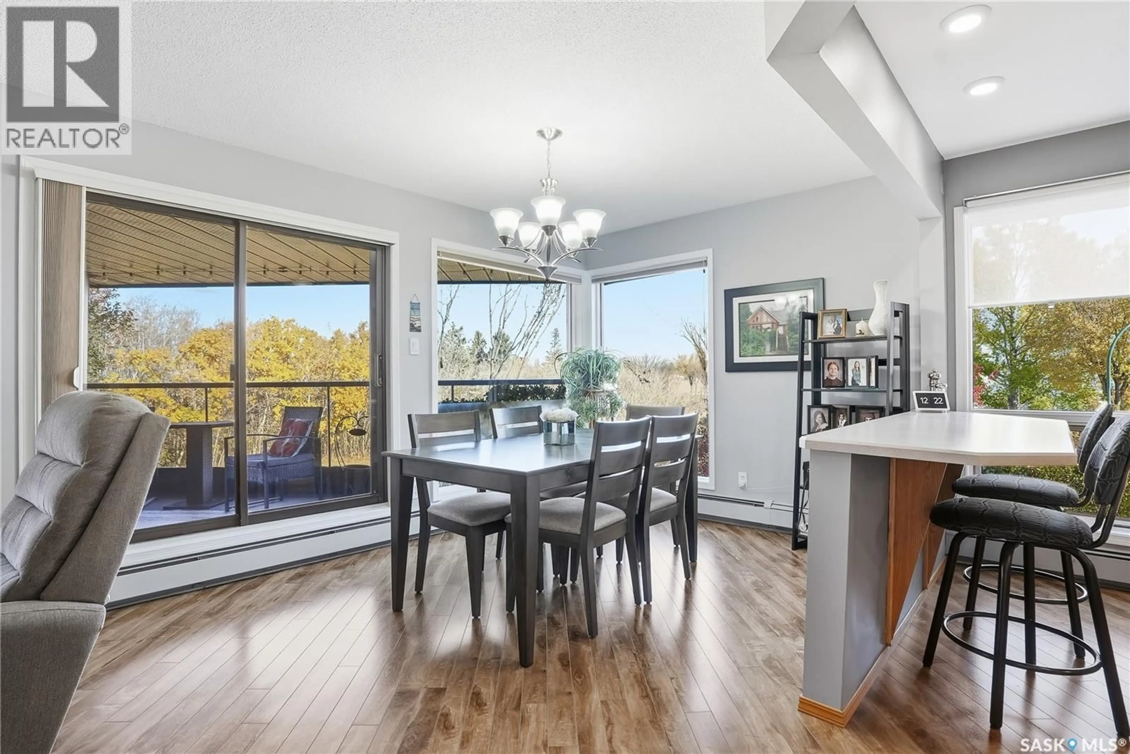 Dining room, wood/laminate floor for 214 2305 ADELAIDE STREET, Saskatoon Saskatchewan S7J5H6