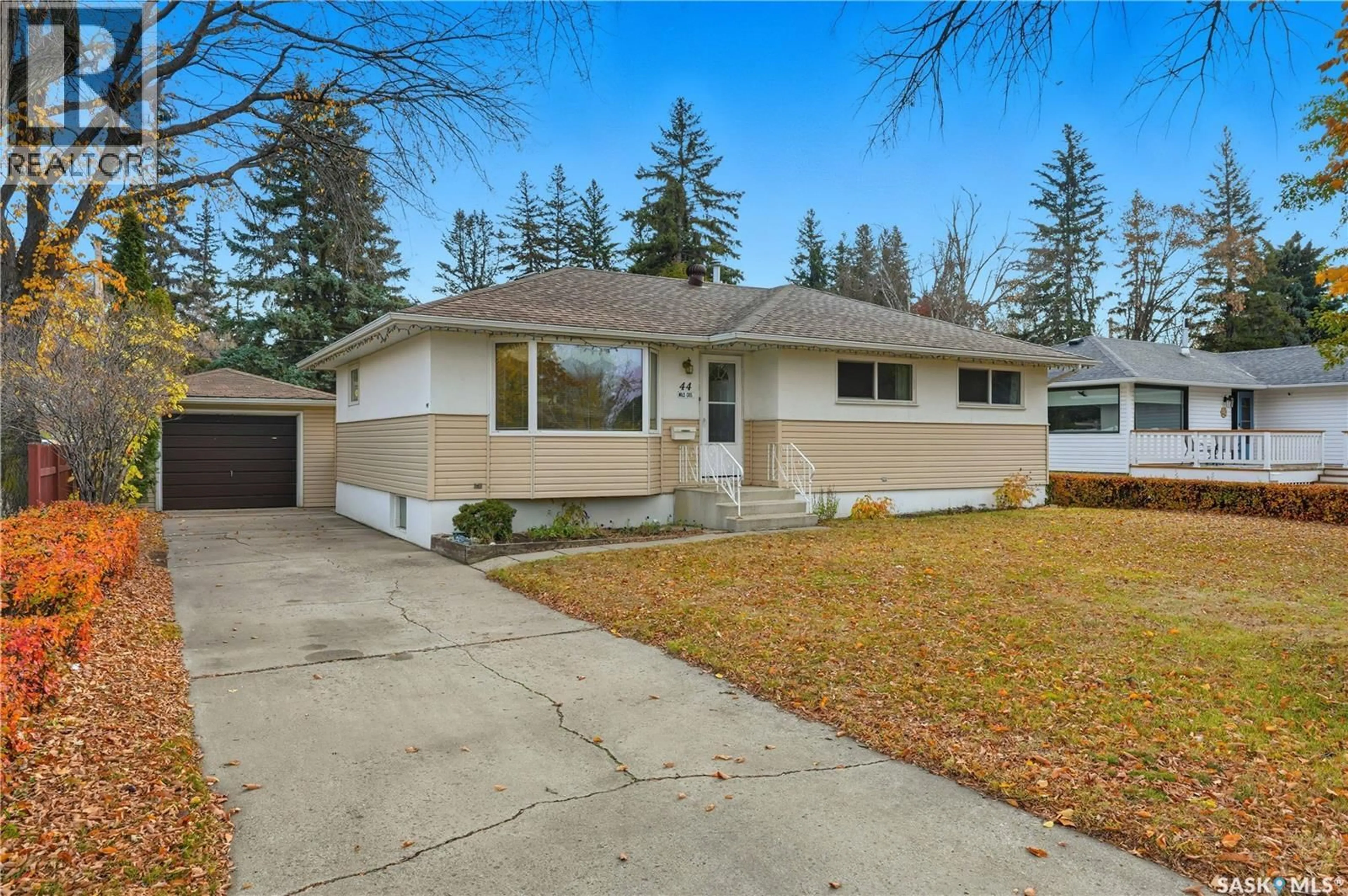 Home with vinyl exterior material, street for 44 MILLS CRESCENT, Saskatoon Saskatchewan S7J0M7