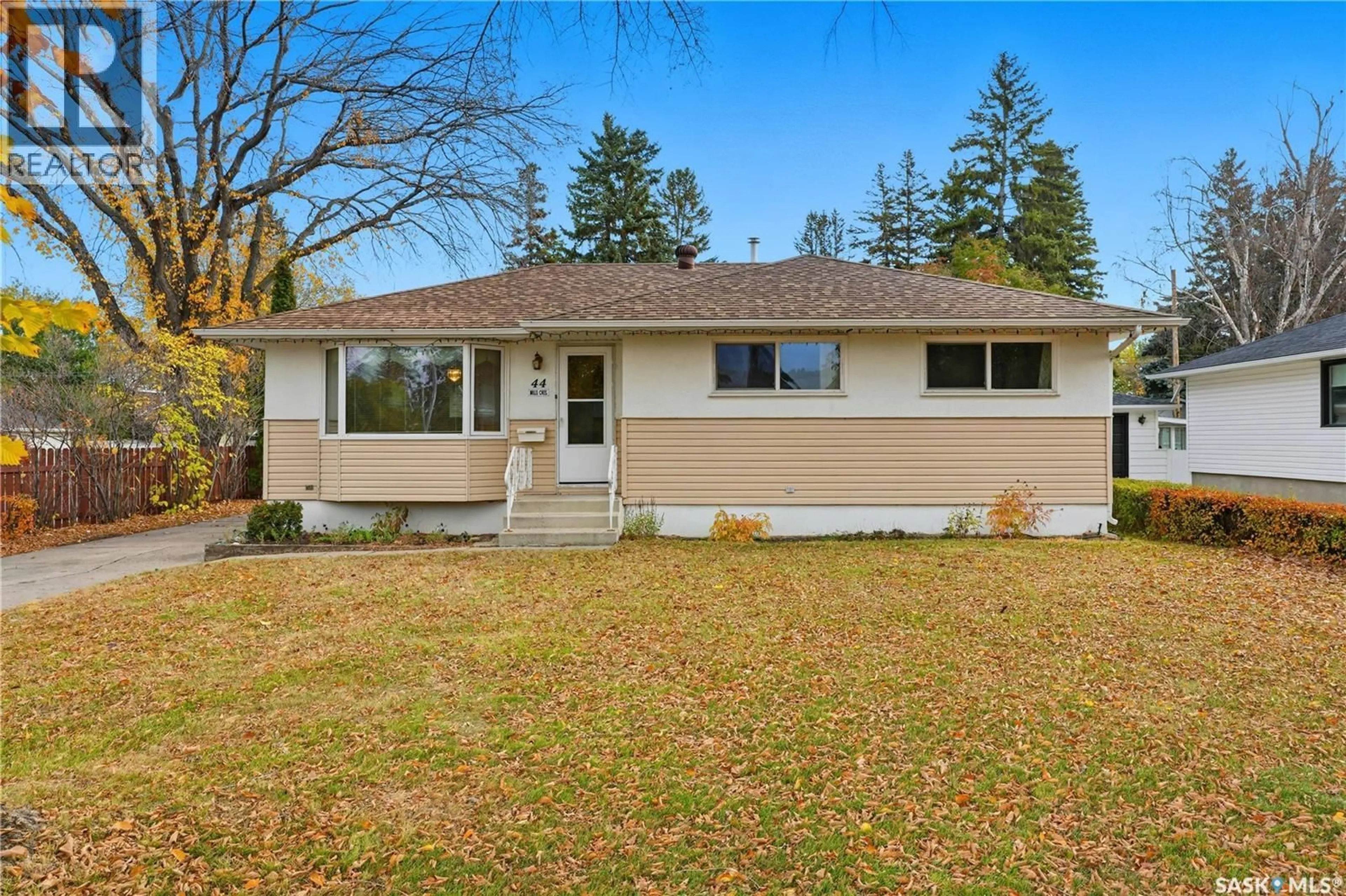 Home with vinyl exterior material, street for 44 MILLS CRESCENT, Saskatoon Saskatchewan S7J0M7