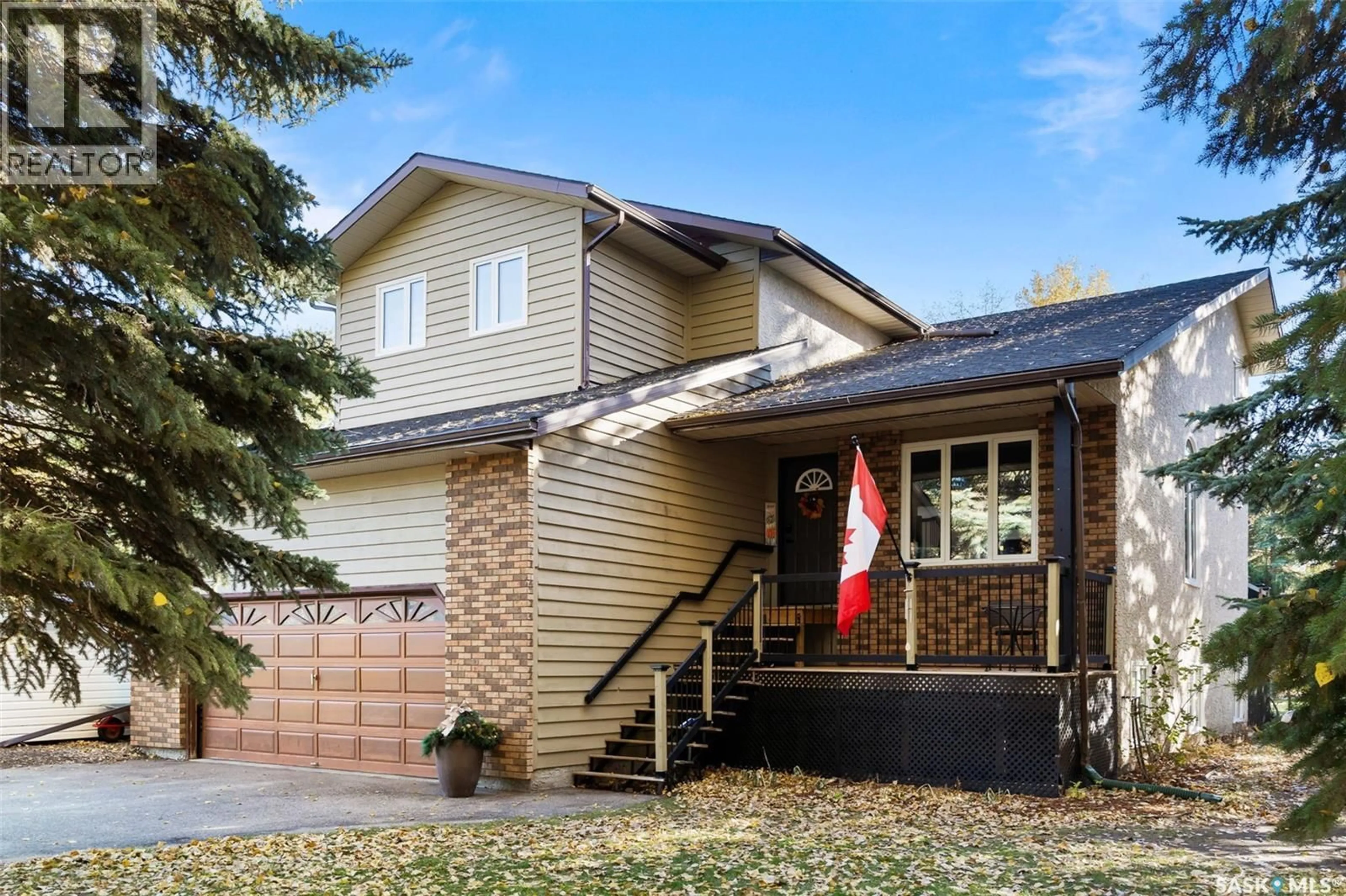 Home with brick exterior material, street for 23 KINGSMERE AVENUE, White City Saskatchewan S4L5B1