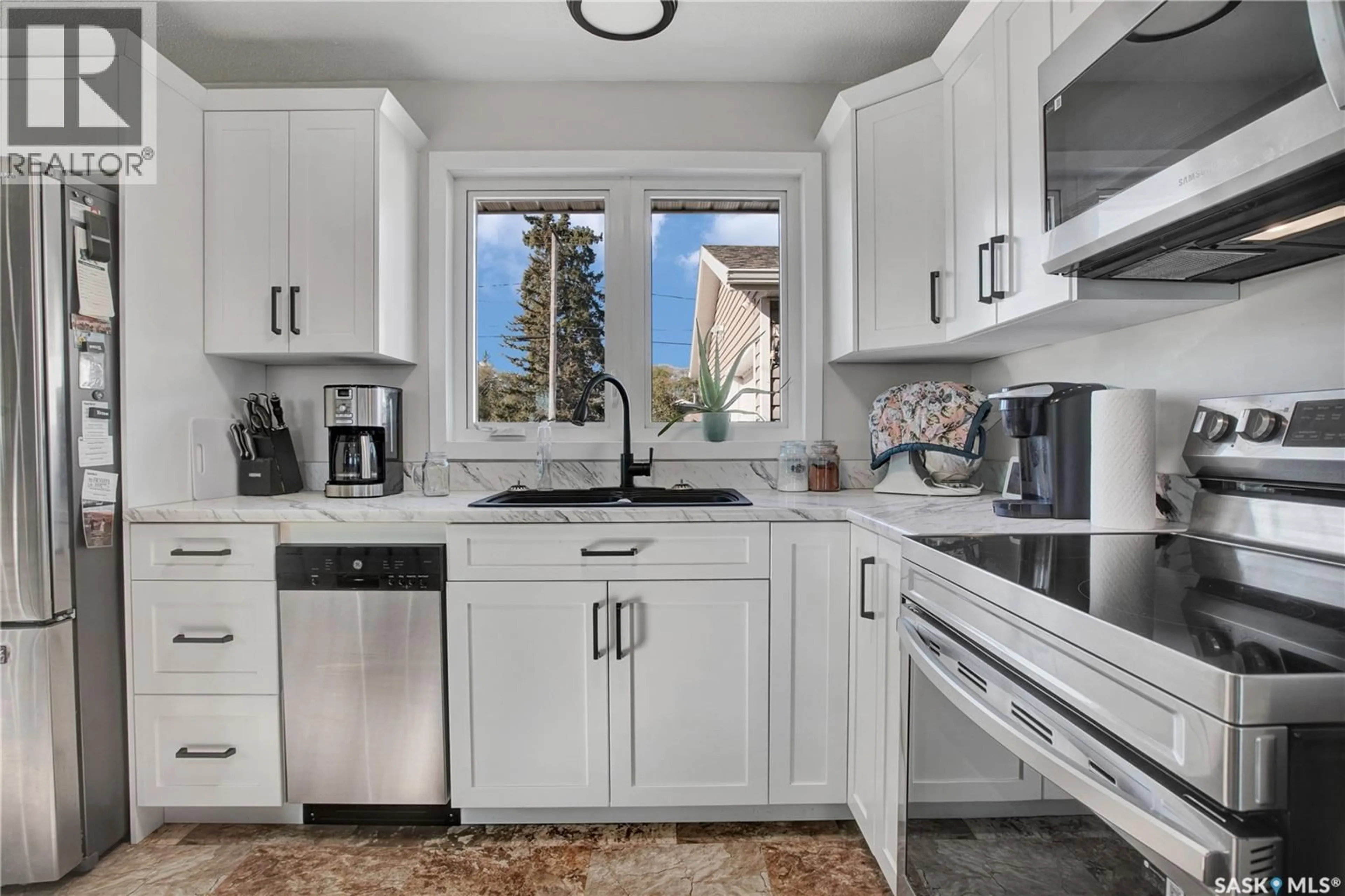 Open concept kitchen, ceramic/tile floor for 305 2ND STREET, Duck Lake Saskatchewan S0K1J0