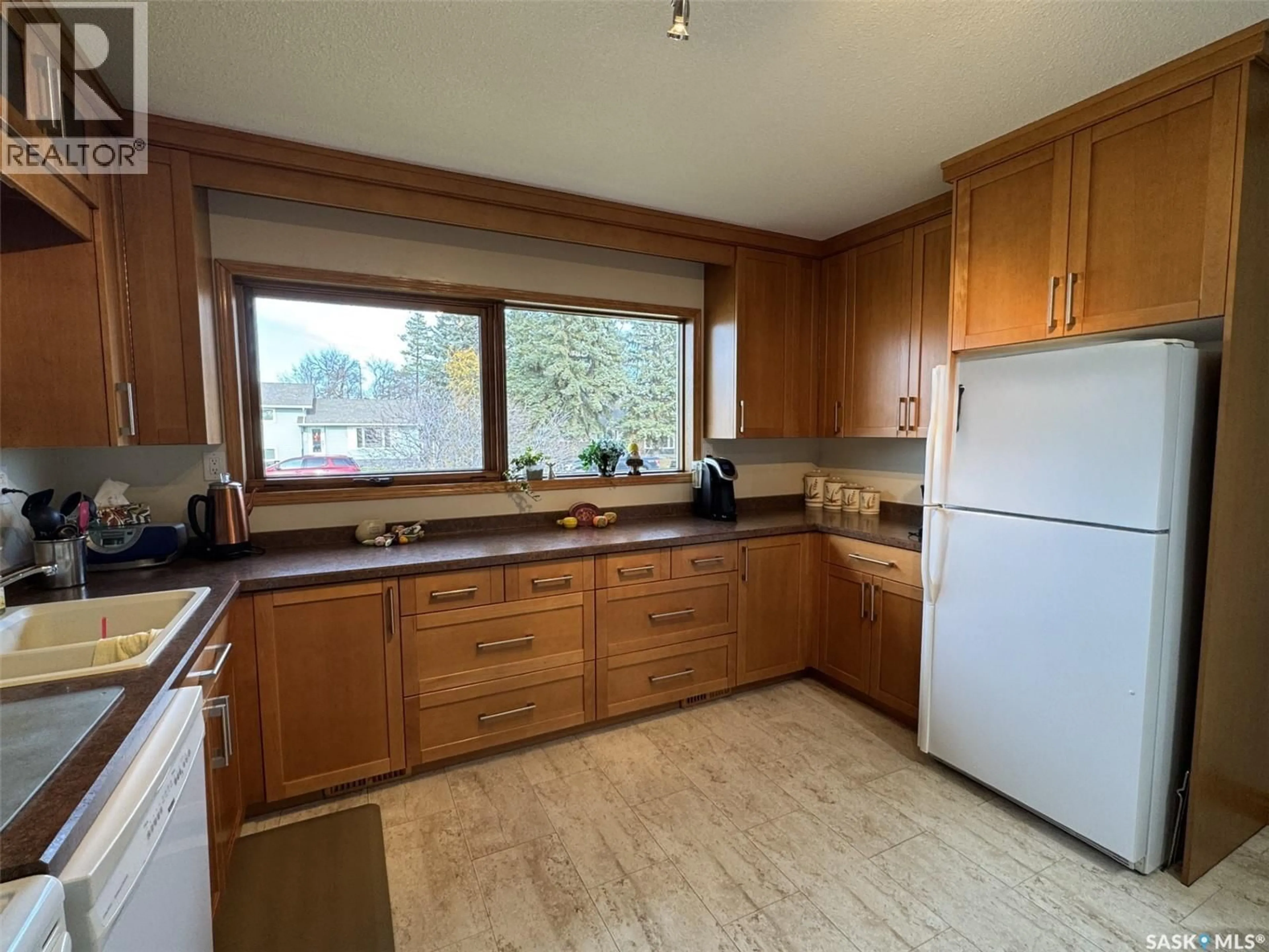 Standard kitchen, wood/laminate floor for 412 7TH AVENUE, Biggar Saskatchewan S0K0M0