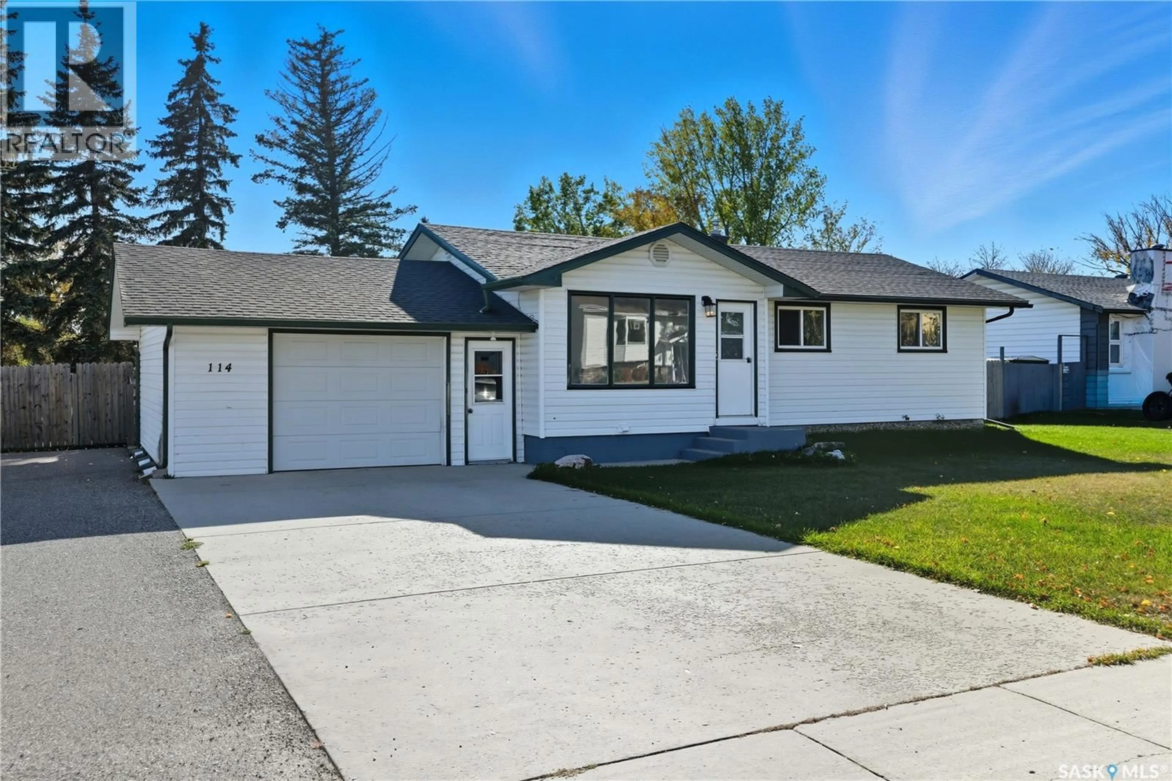 Home with vinyl exterior material, street for 114 2ND STREET, Martensville Saskatchewan S0K2T0