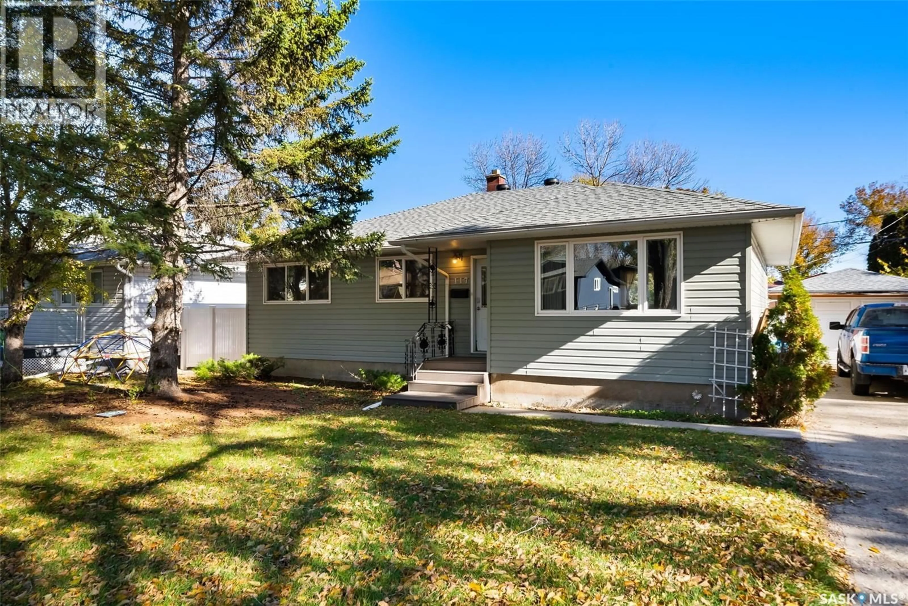 Home with vinyl exterior material, street for 117 LANGLEY STREET, Regina Saskatchewan S4S3V7