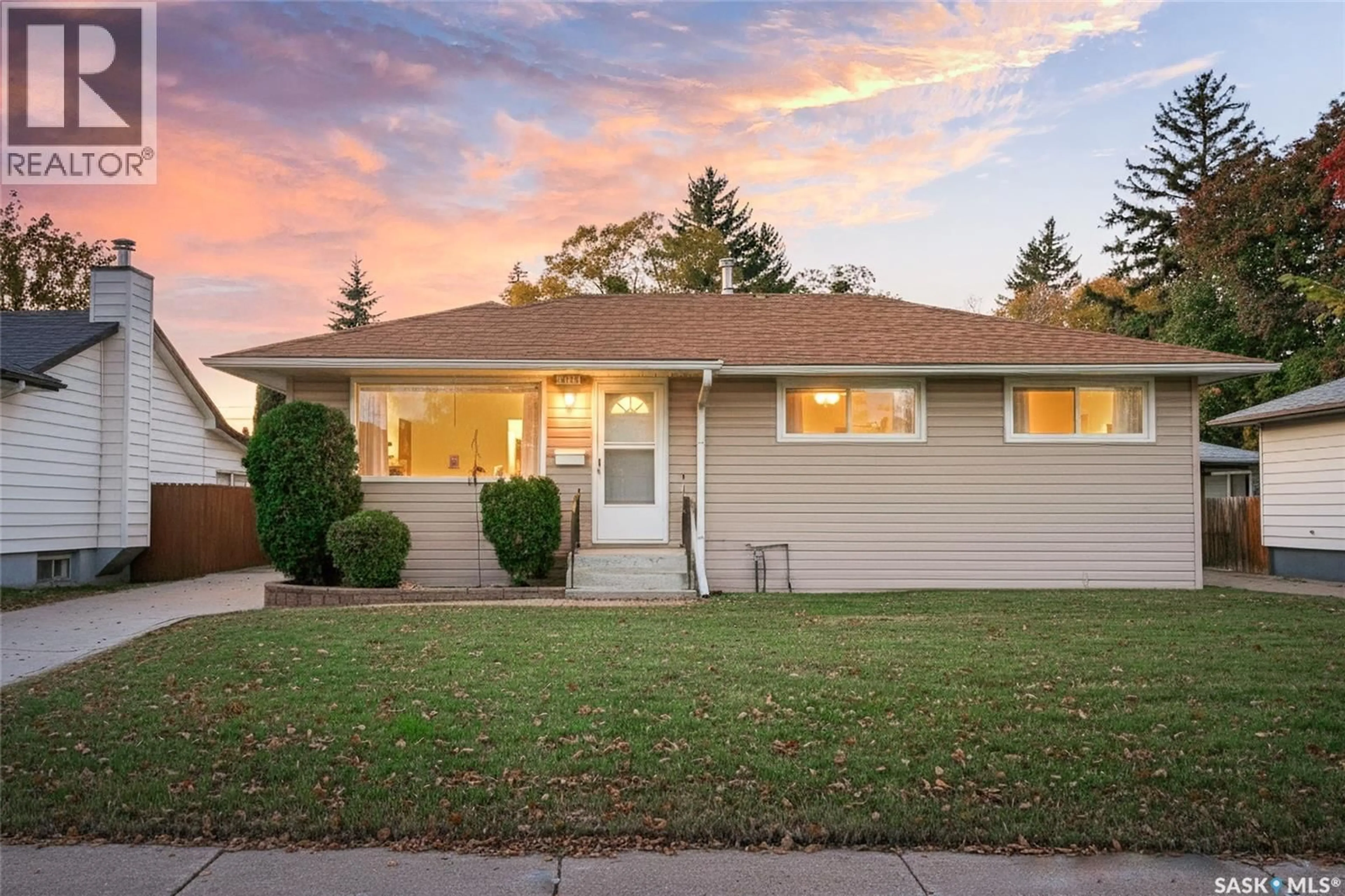 Home with vinyl exterior material, street for 1810 SOMMERFELD AVENUE, Saskatoon Saskatchewan S7H2S8
