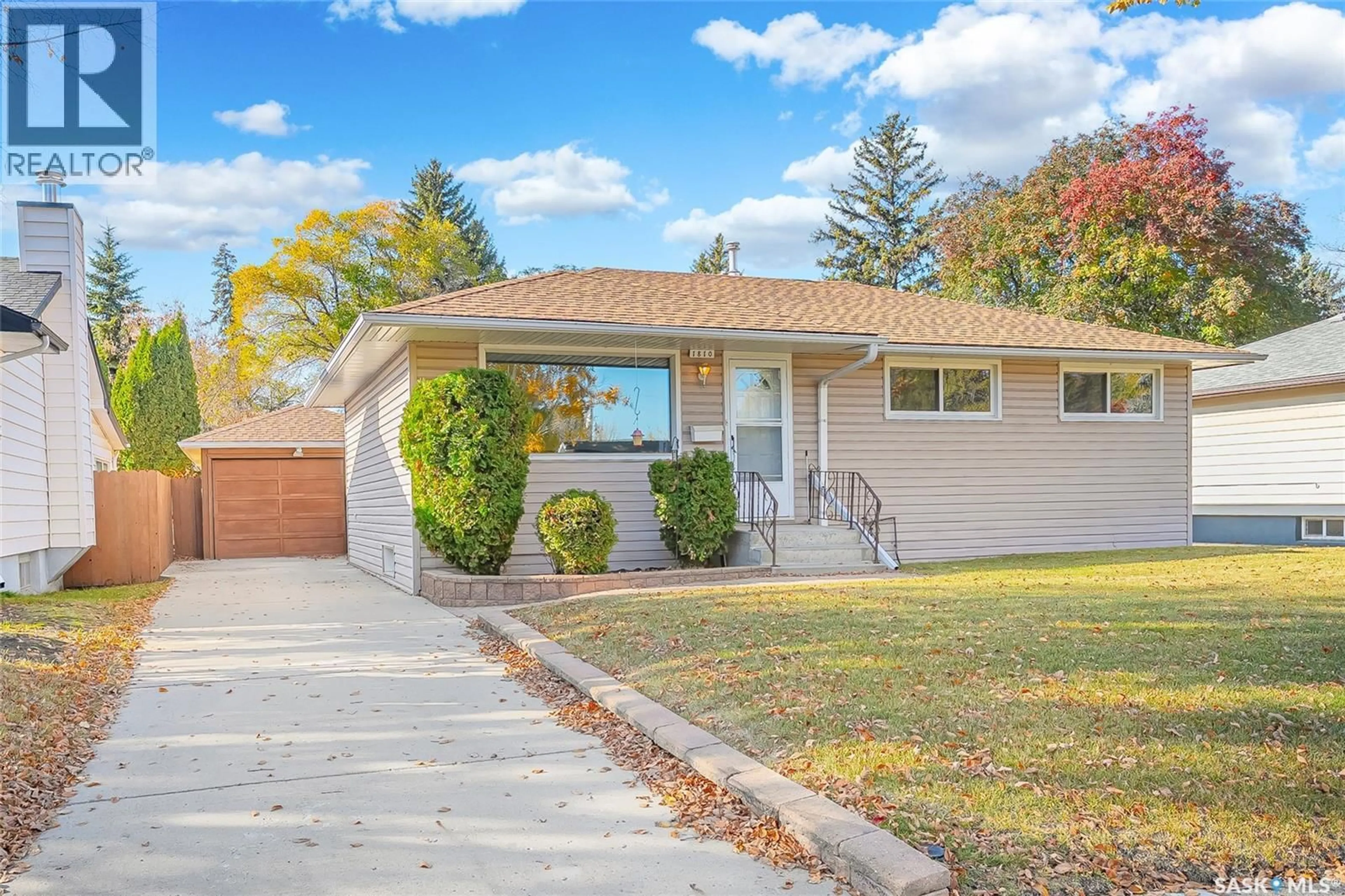 Home with vinyl exterior material, street for 1810 SOMMERFELD AVENUE, Saskatoon Saskatchewan S7H2S8