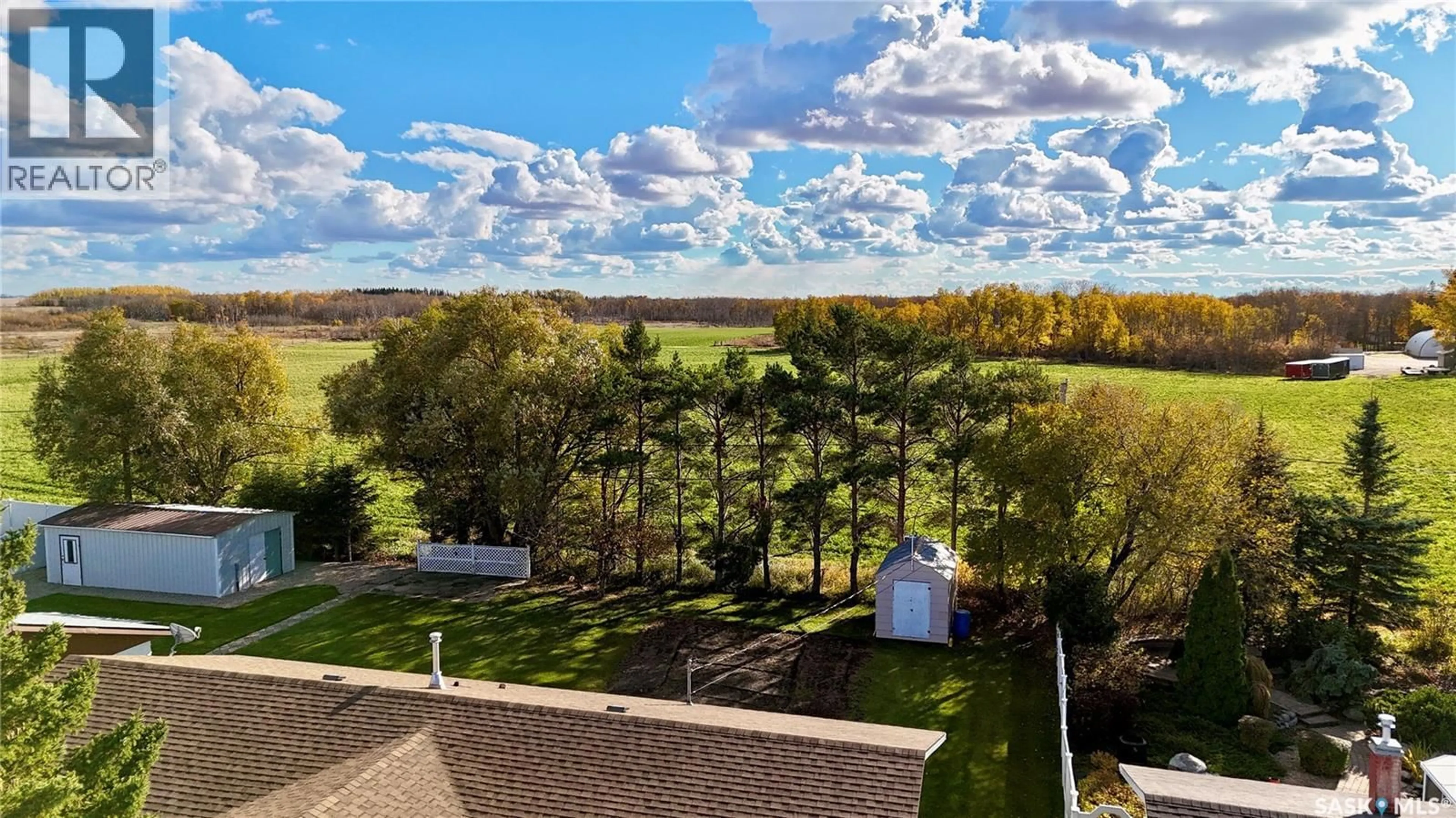 A pic from outside/outdoor area/front of a property/back of a property/a pic from drone, water/lake/river/ocean view for 221 RIVER HEIGHTS DRIVE, Langenburg Saskatchewan S0A2A0
