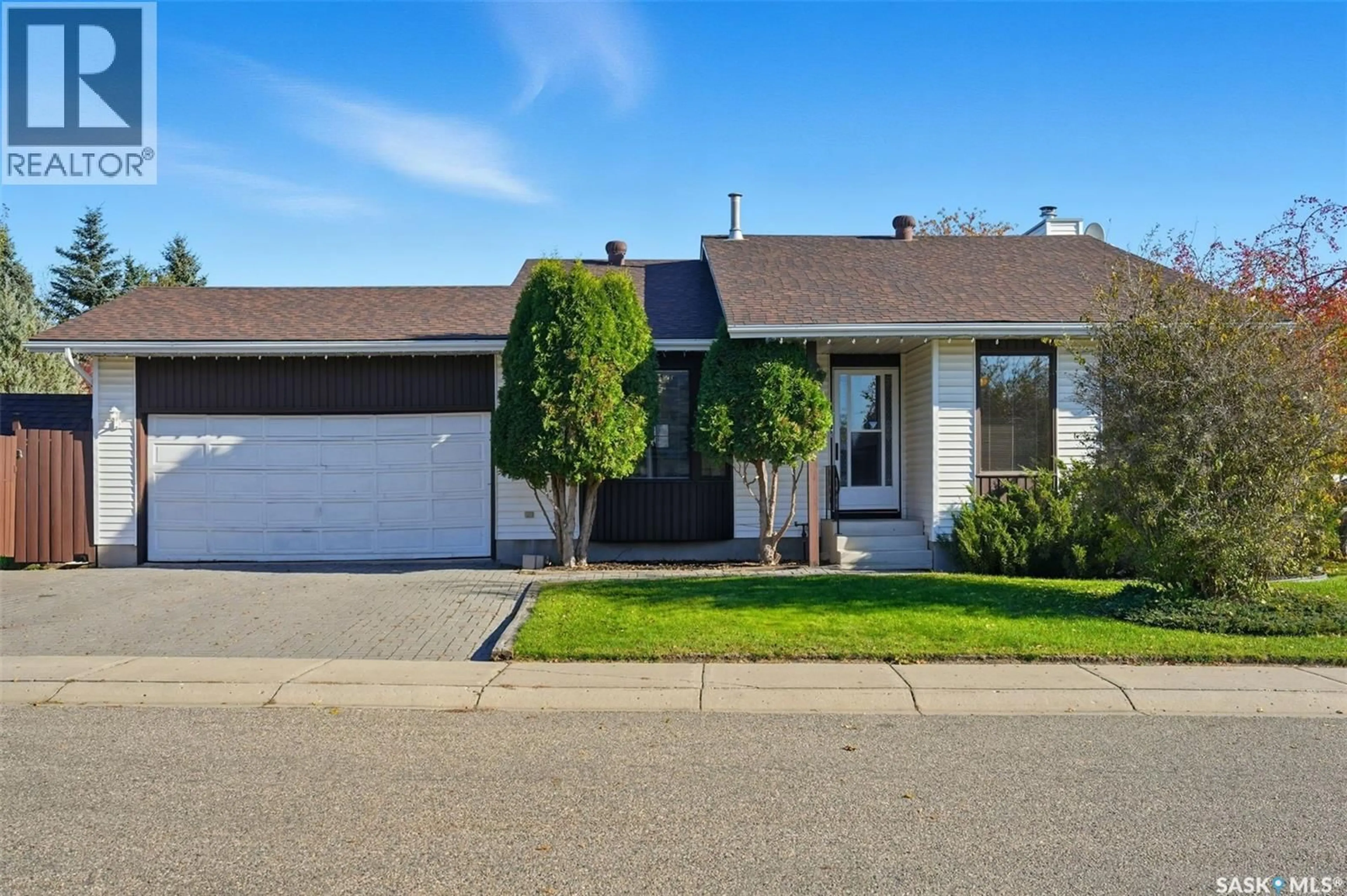 Home with vinyl exterior material, street for 207 NEMEIBEN ROAD, Saskatoon Saskatchewan S7J4S8