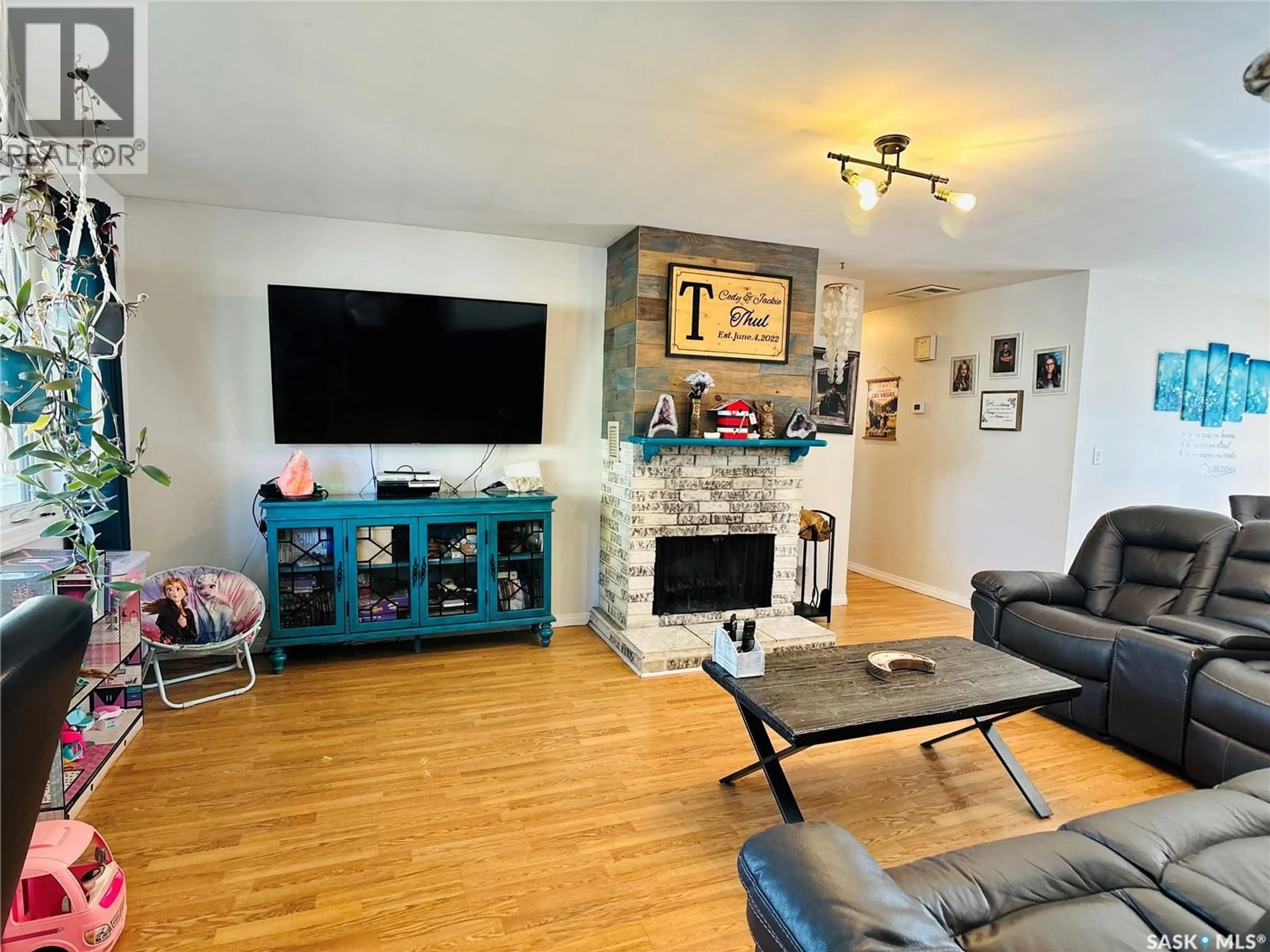 Living room with furniture, unknown for 1703 MCCORMICK CRESCENT, Estevan Saskatchewan S4A1W4
