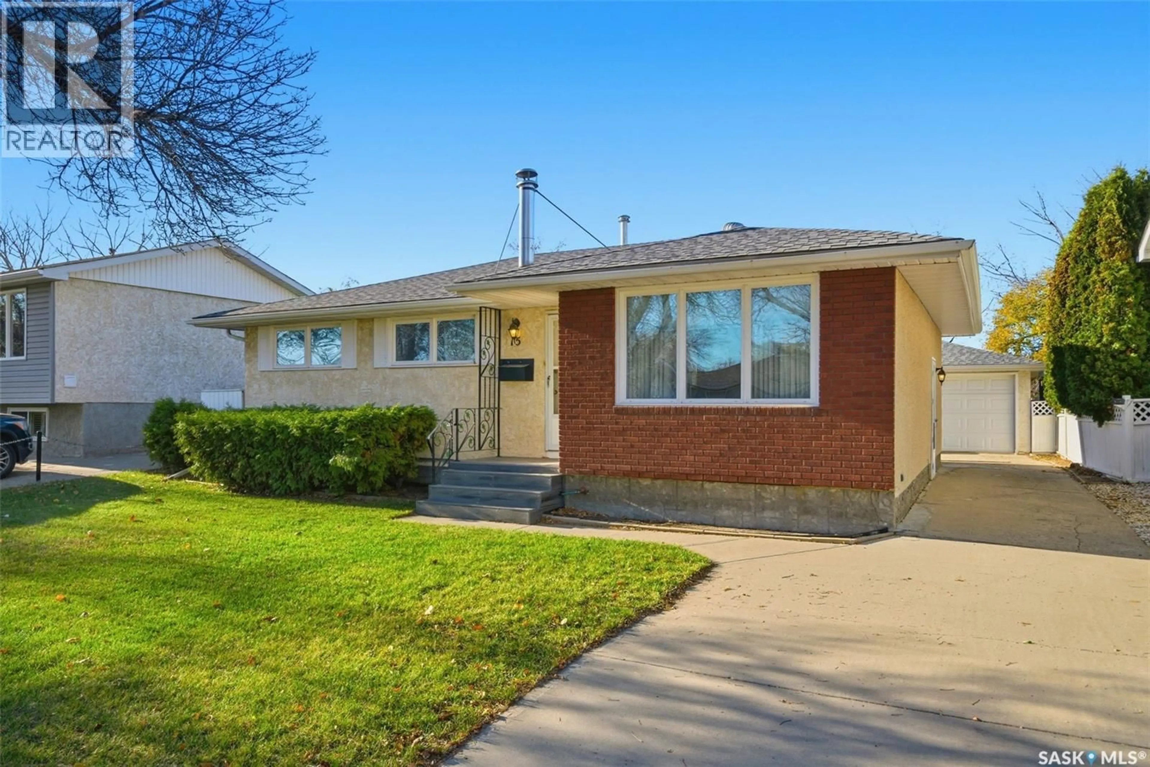 Home with vinyl exterior material, street for 15 BASTEDO CRESCENT, Regina Saskatchewan S4T7A3