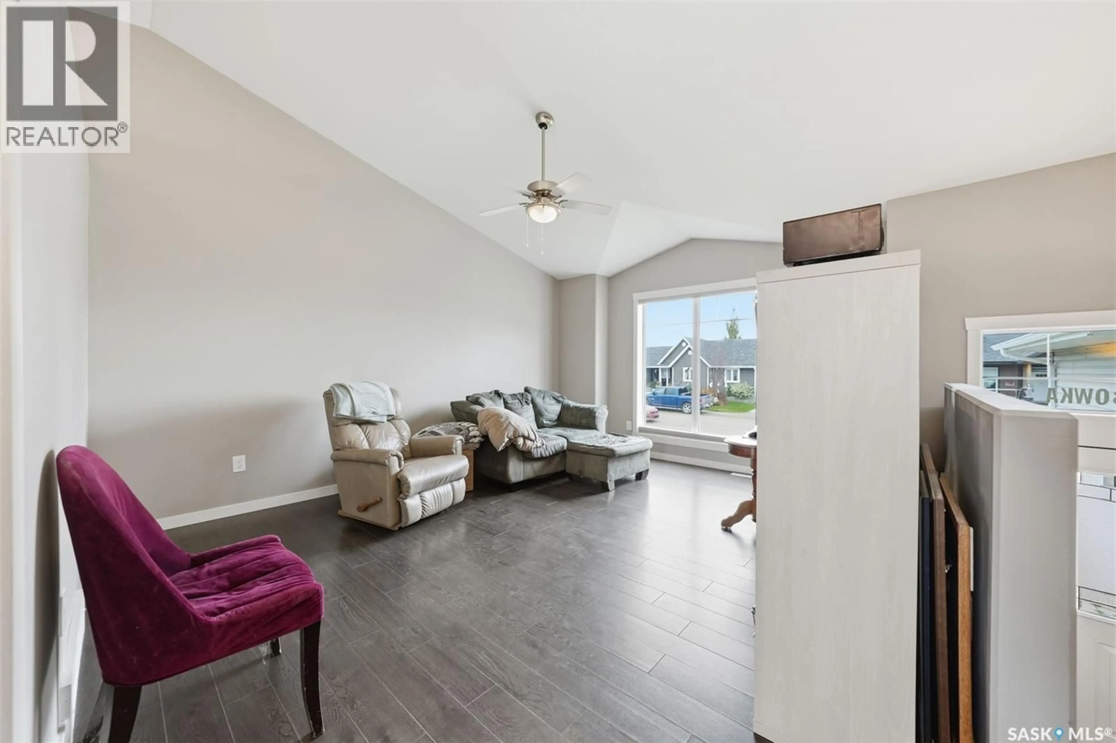 Living room with furniture, wood/laminate floor for 1 DERBOWKA DRIVE, Borden Saskatchewan S0K0N0