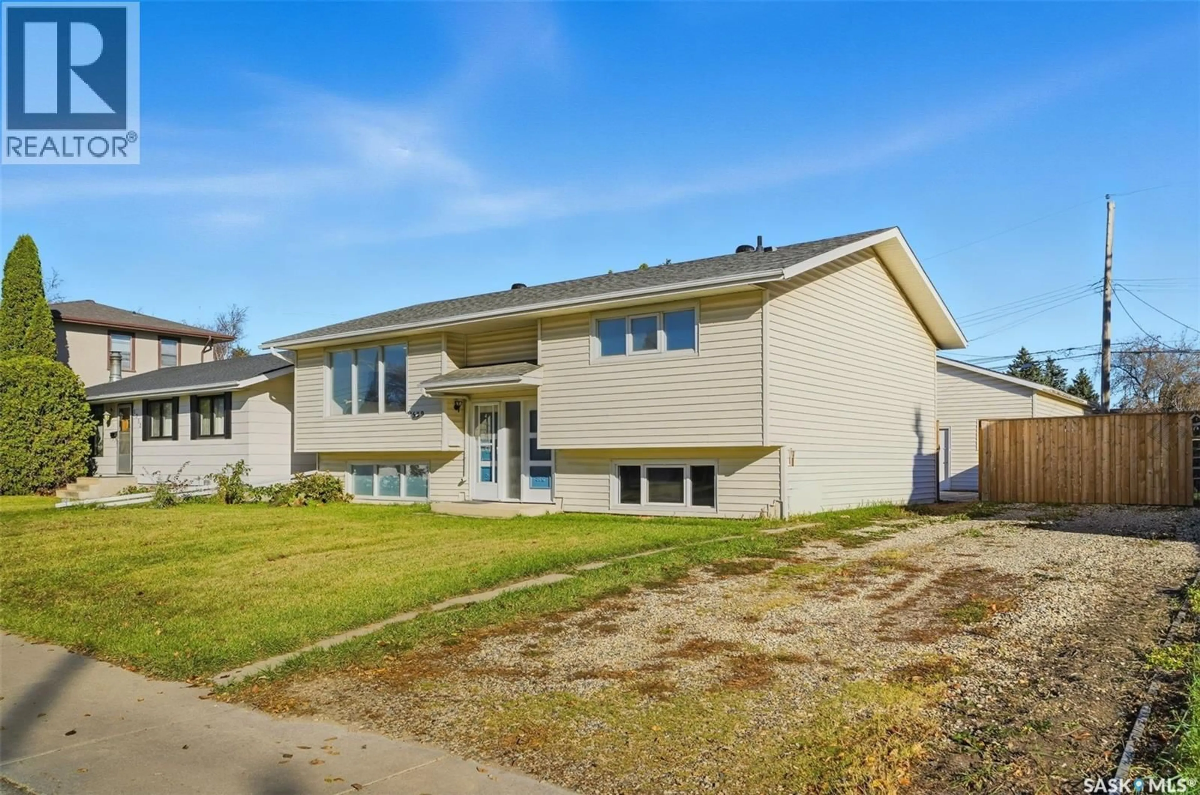 Home with vinyl exterior material, street for 1529 CENTRAL AVENUE, Saskatoon Saskatchewan S7N2H3