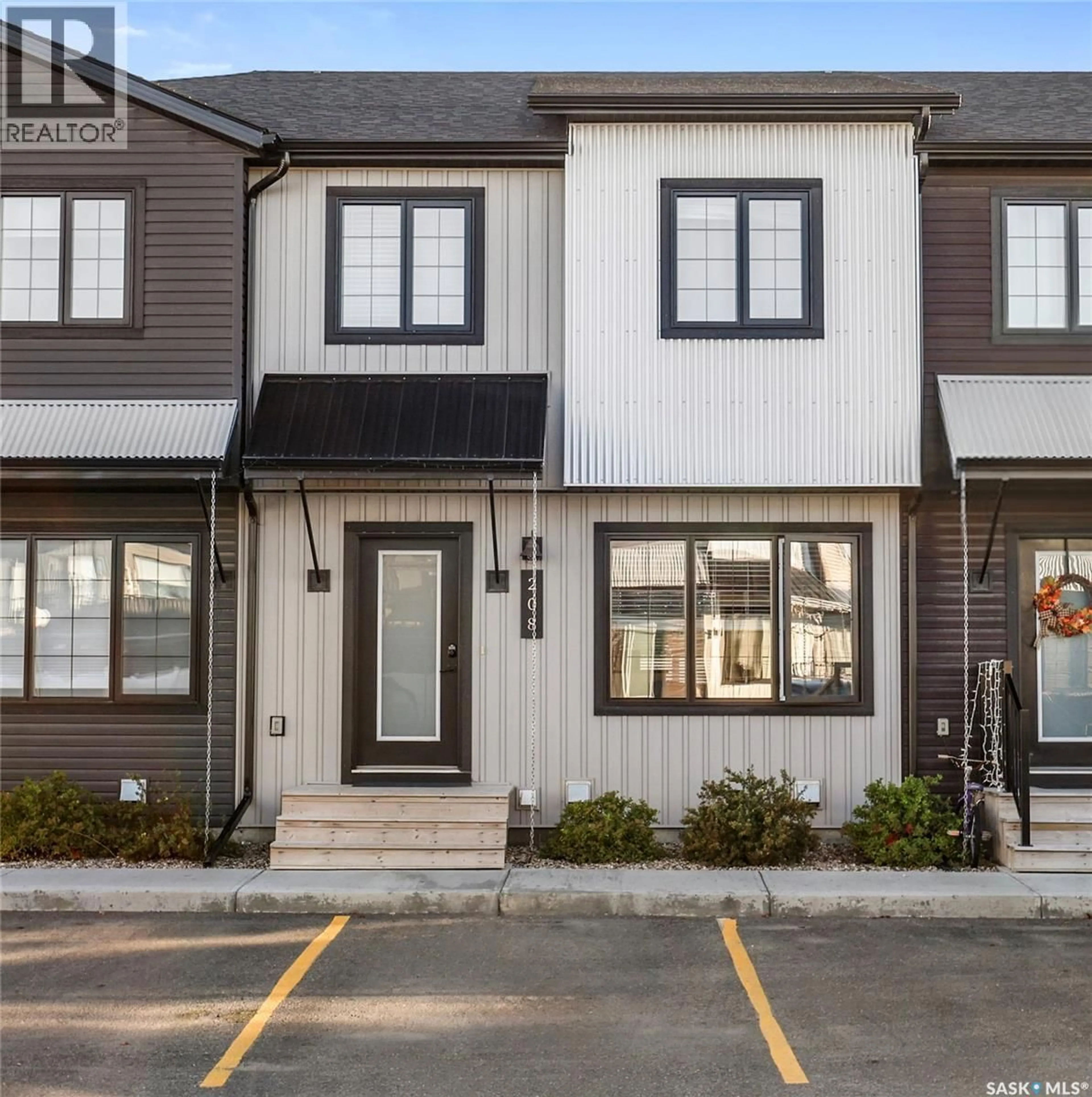 Home with vinyl exterior material, street for 208 - 2715 NARCISSE DRIVE, Regina Saskatchewan S4X0P8