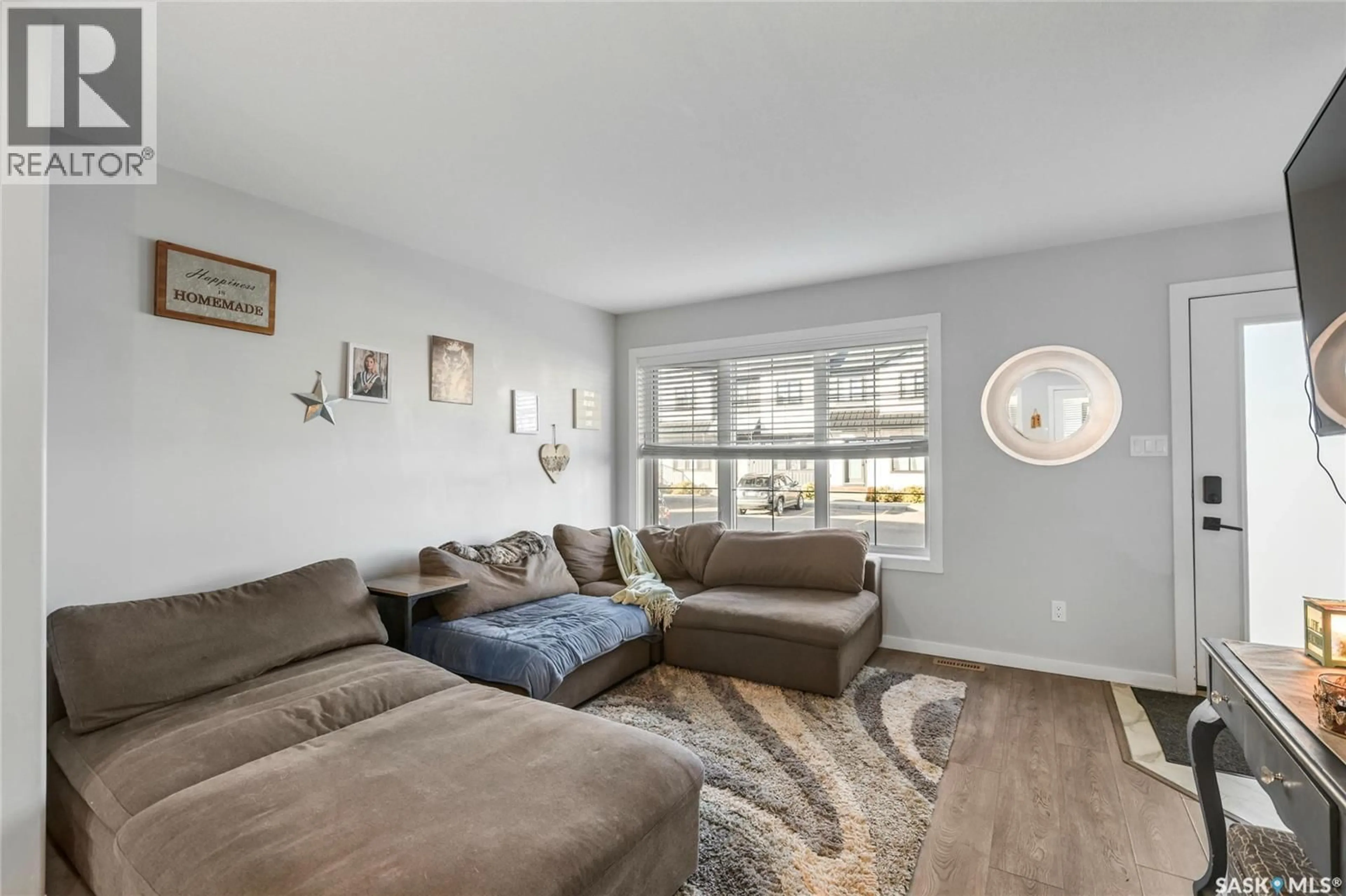 Living room with furniture, unknown for 208 - 2715 NARCISSE DRIVE, Regina Saskatchewan S4X0P8