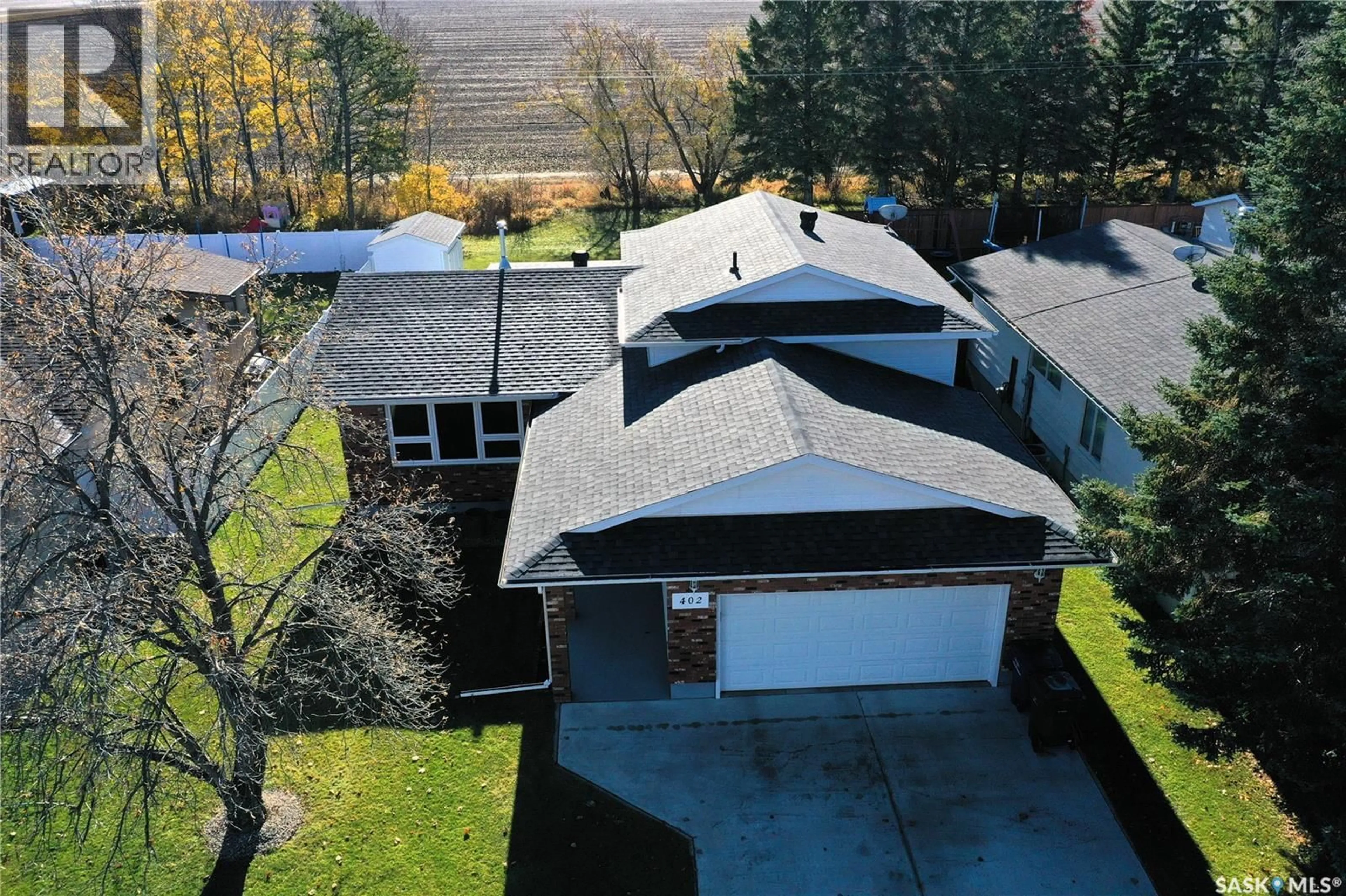 A pic from outside/outdoor area/front of a property/back of a property/a pic from drone, mountain view for 402 WATSON CRESCENT, Nipawin Saskatchewan S0E1E0