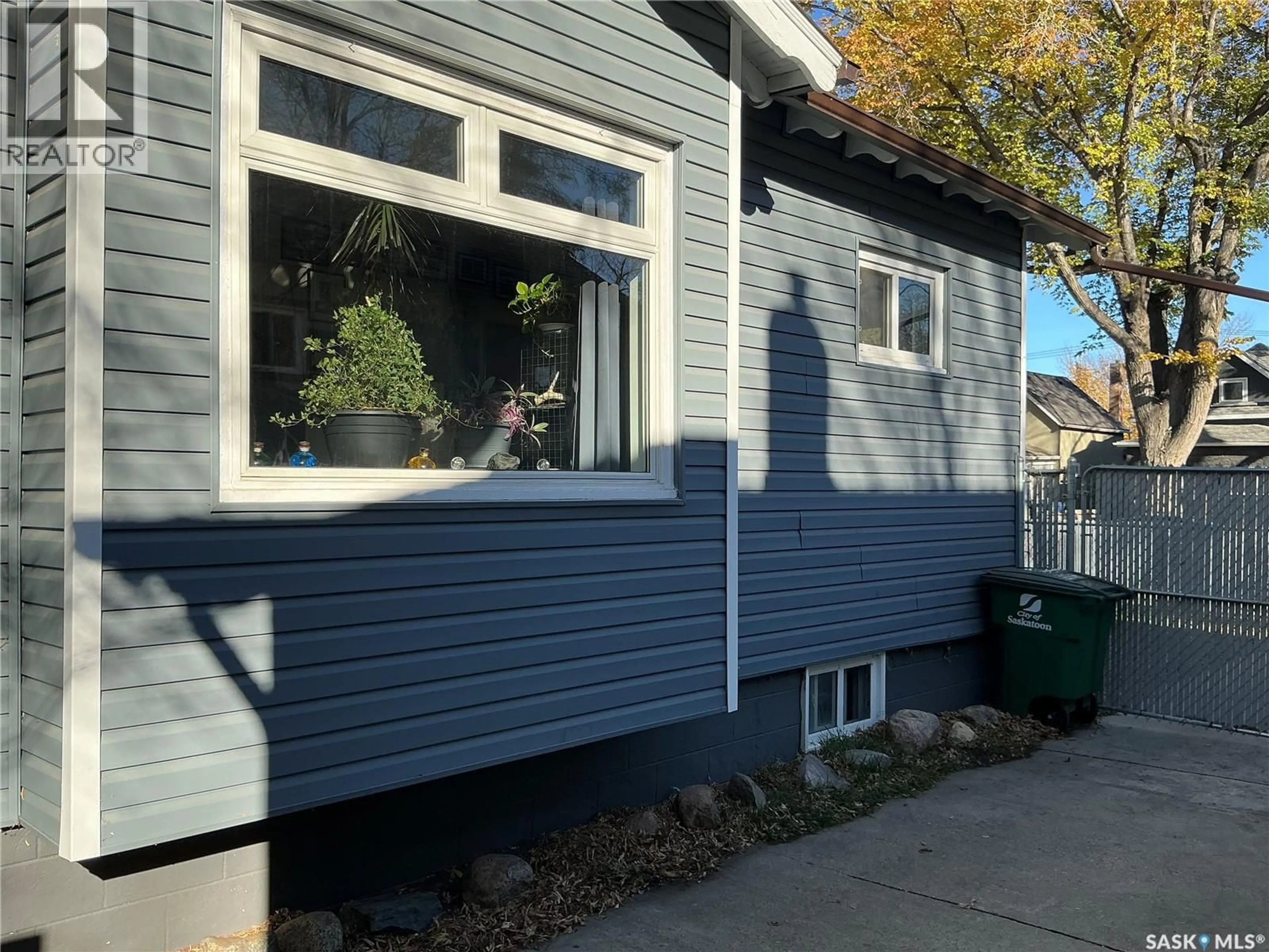 Home with vinyl exterior material, street for 329 I AVENUE, Saskatoon Saskatchewan S7M1Y1